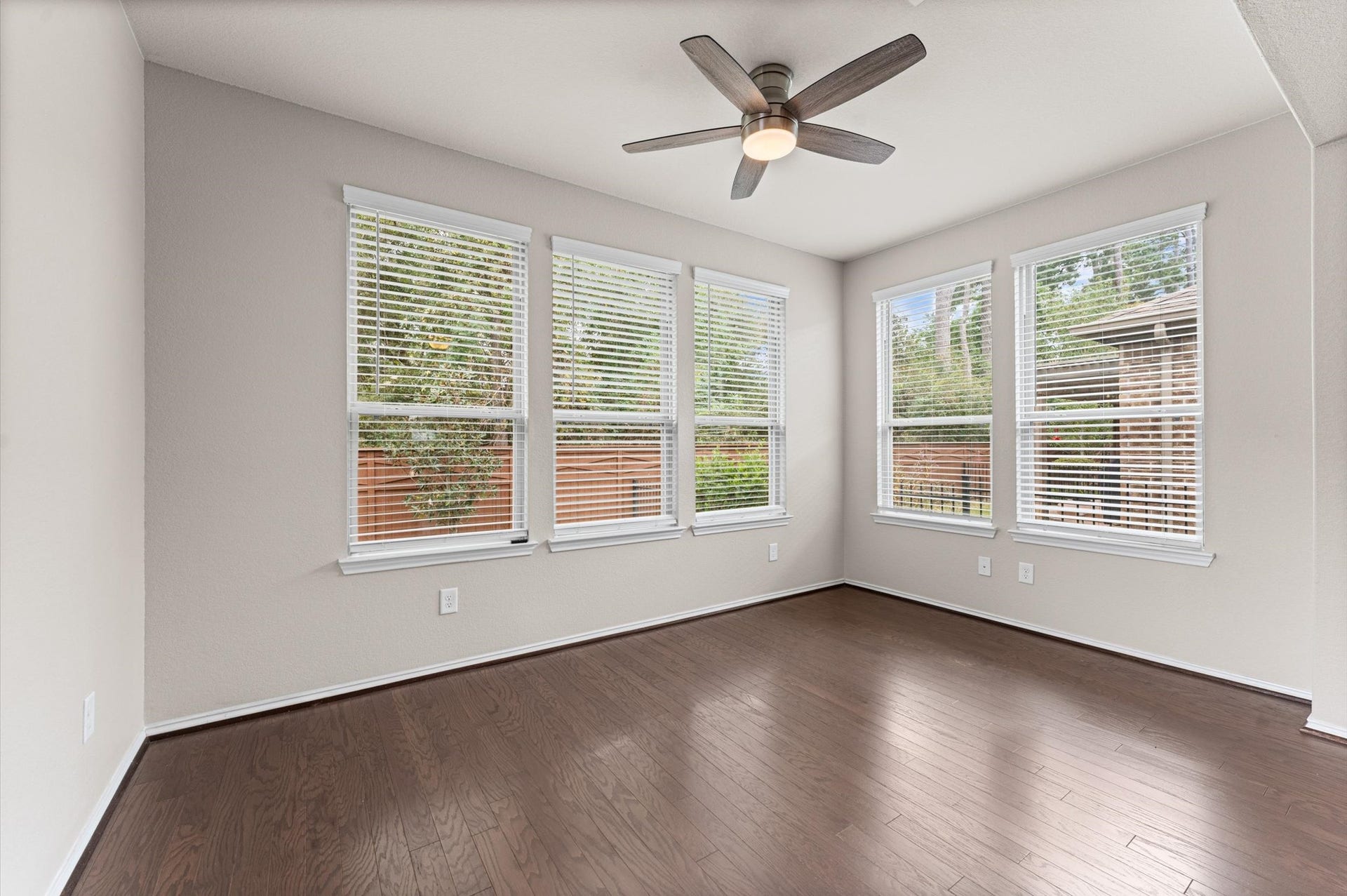 317 Fell Lane, Spring, TX 77382 A sunroom designed around sweeping views of the green space behind your property serves as the ultimate transitional bridge between indoor comfort and outdoor serenity.
