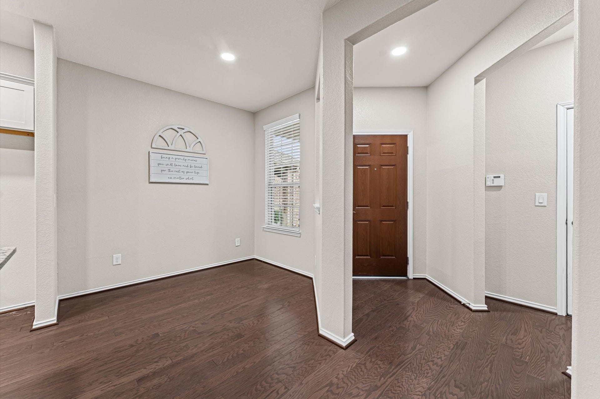 317 Fell Lane, Spring, TX 77382 A quaint dining room serves as the intimate, sophisticated core of the homeproviding the perfect, dedicated backdrop for elegant holiday dinners and long, lingering conversations with family and friends.