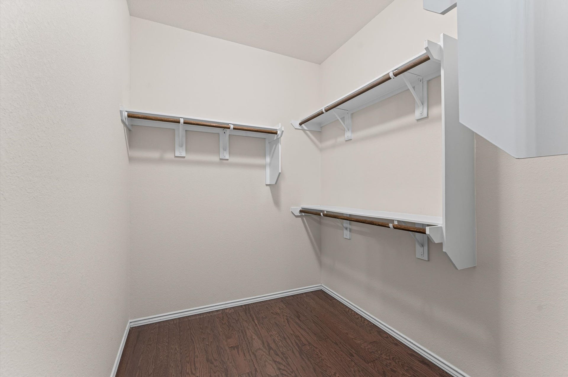 317 Fell Lane, Spring, TX 77382 Pairing a commodious double vanity layout with a huge walk-in closet transforms your master suite into a seamless, high-end dressing room experience.