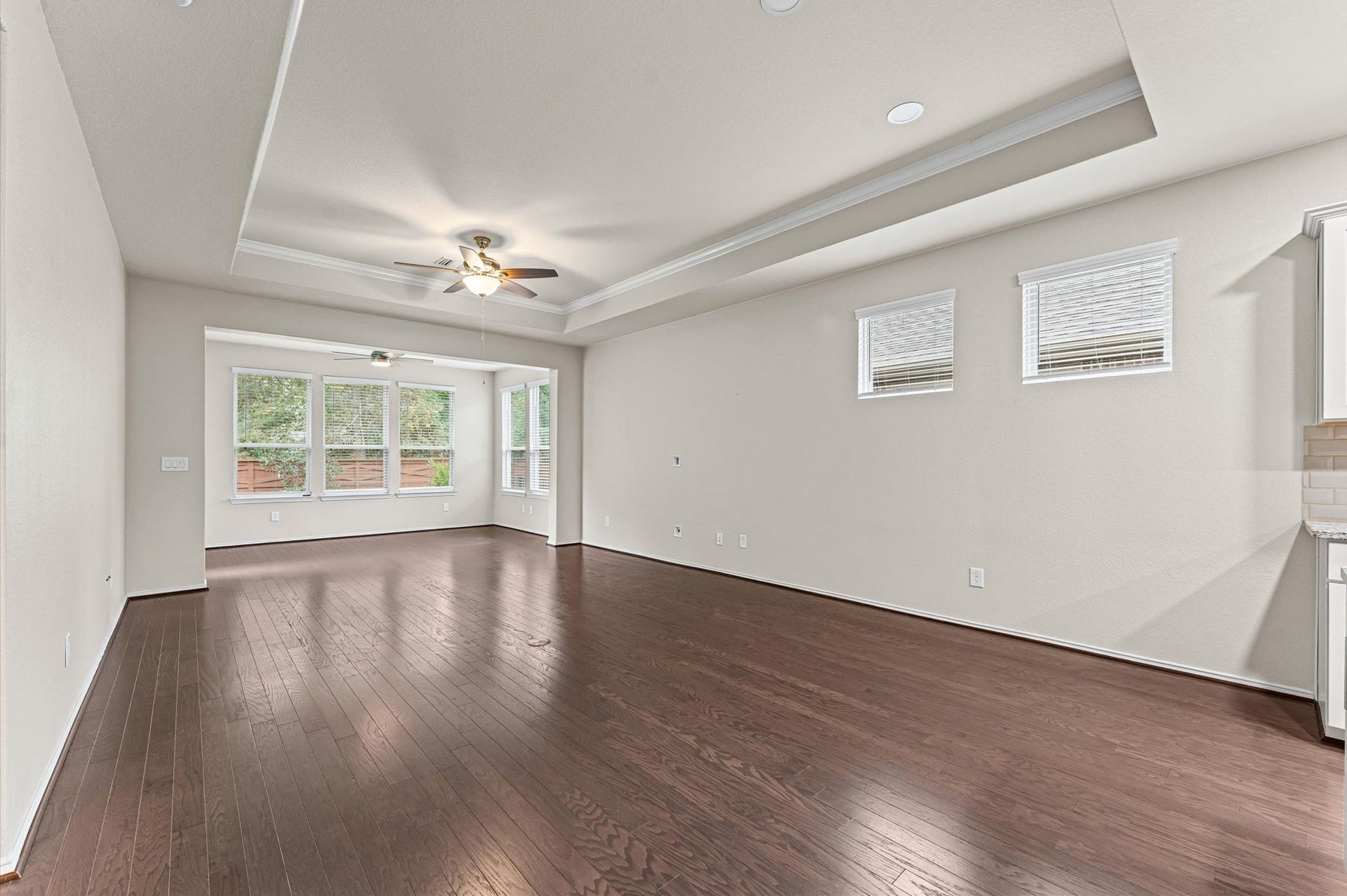 317 Fell Lane, Spring, TX 77382 Anchored by dramatic, soaring vaulted ceilings, the expansive living room offers a magnificent, airy volume that forms the perfect center for effortless relaxation or upscale entertaining..