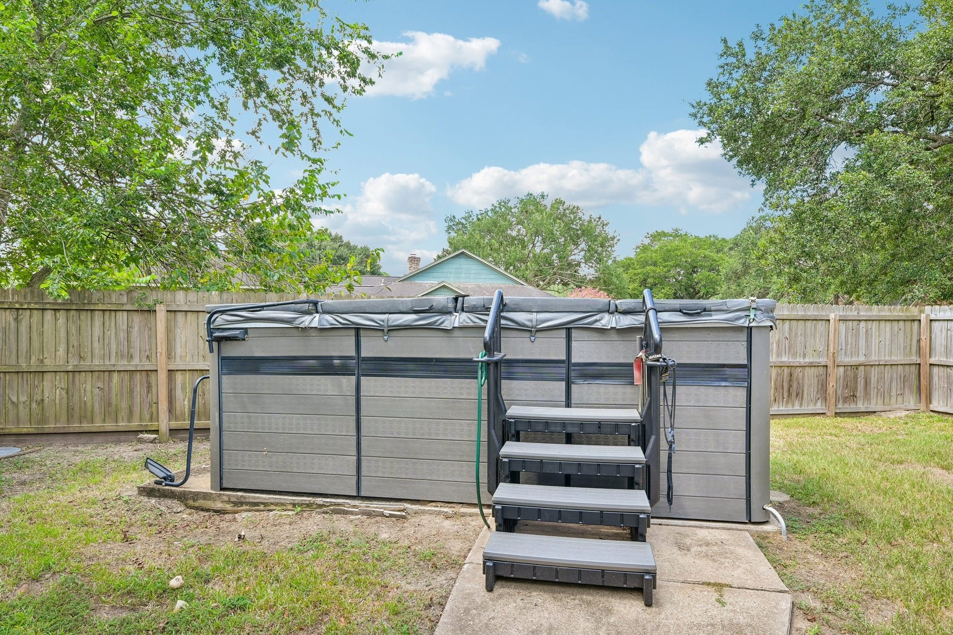 101 W Larkspur Drive, Alvin, TX 77511 Spa you can enjoy year round whether it is hot or cold outside. Fully fenced side yard, so very private as well.
