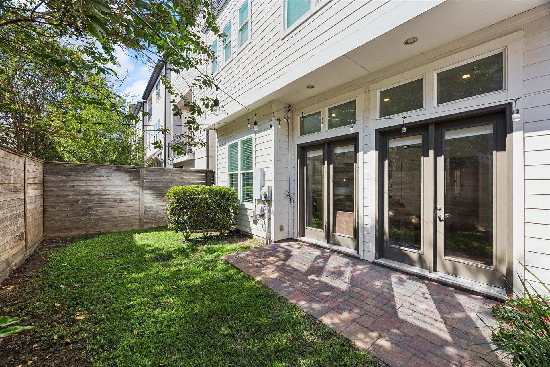 2018 Covent Garden Station, Houston, TX 77045 Off the Living Room's french doors, you are welcomed by an oversized backyard.