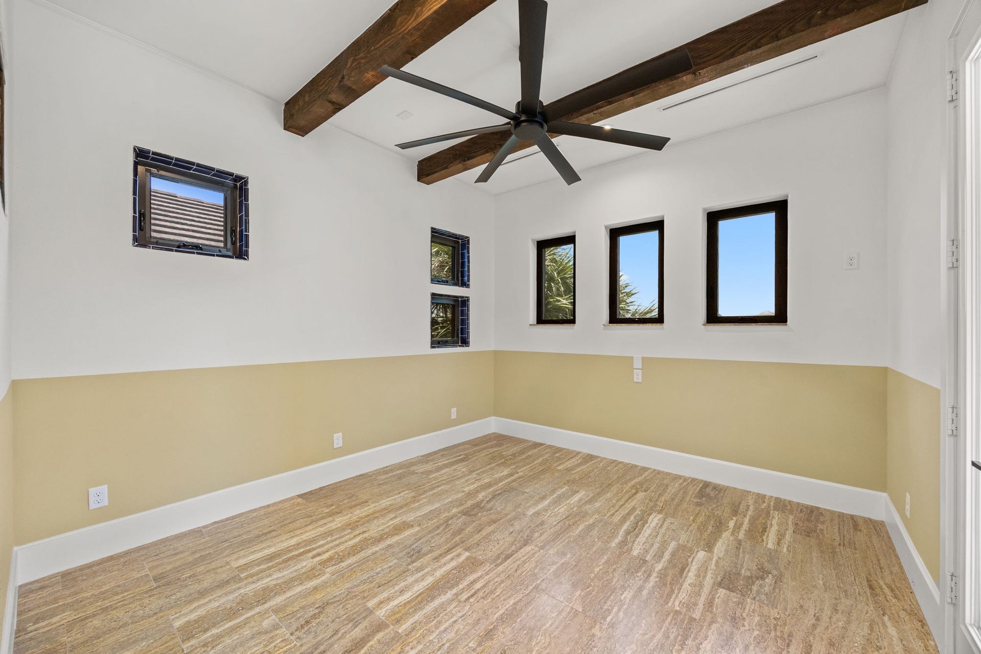 721 Harborside Way, League City, TX 77565 A versatile flex room connects the primary bedroom and bath and includes direct access to the balcony, enhancing the suites private retreat feel.