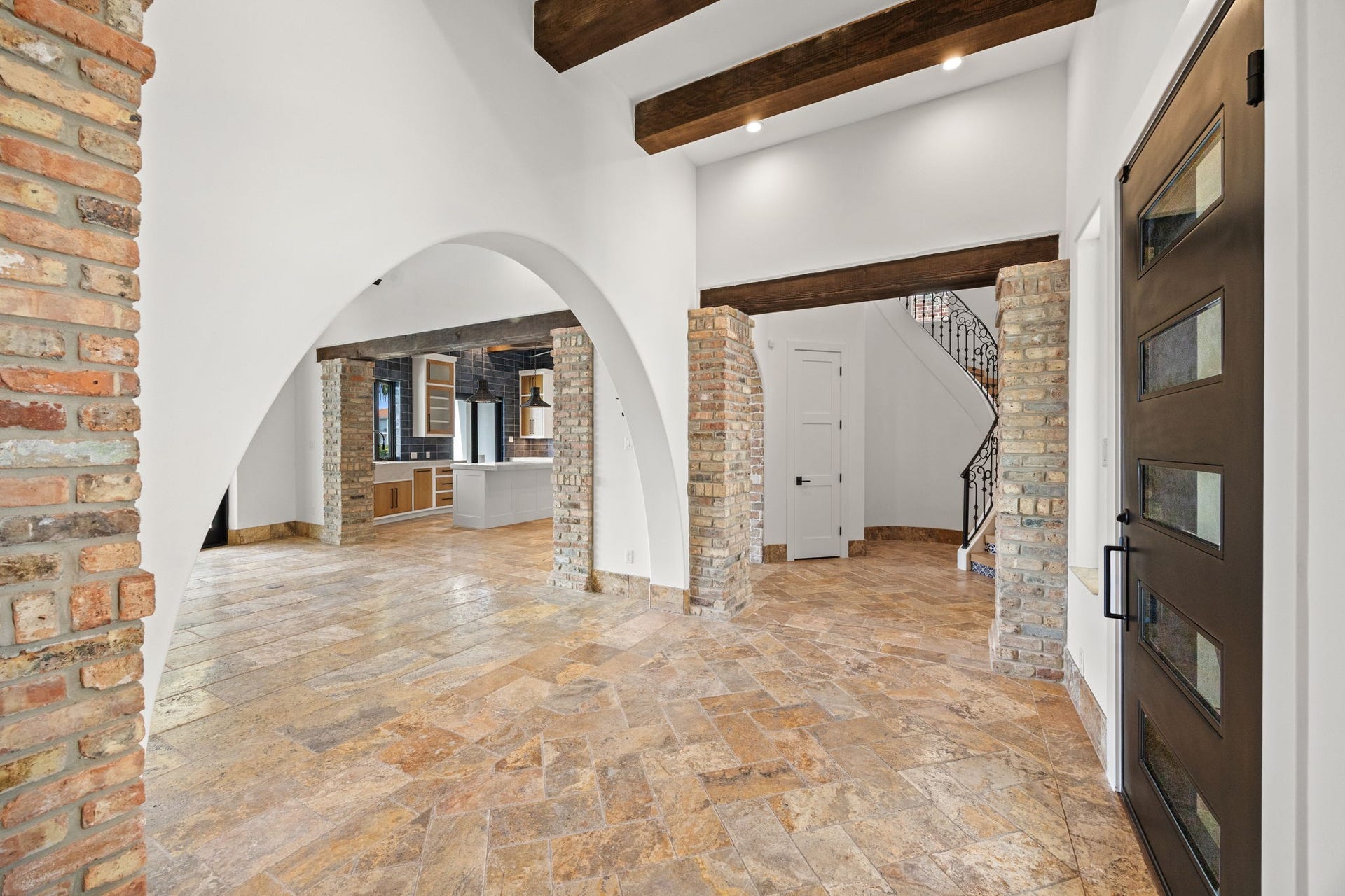721 Harborside Way, League City, TX 77565 Another angle of the entryway highlights its grand scale and rich architectural detailing, offering a striking first impression from every perspective.