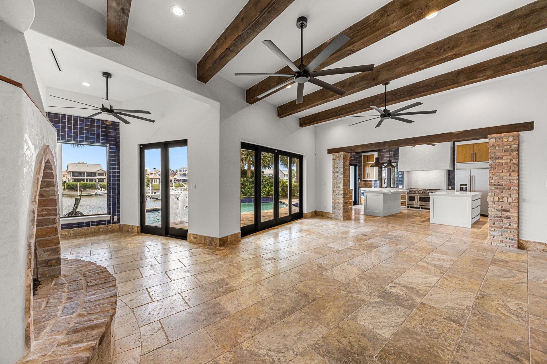 721 Harborside Way, League City, TX 77565 From the living room, the chef's kitchen takes center stage with its impressive double islands, custom finishes, and thoughtfully designed gathering spaces.