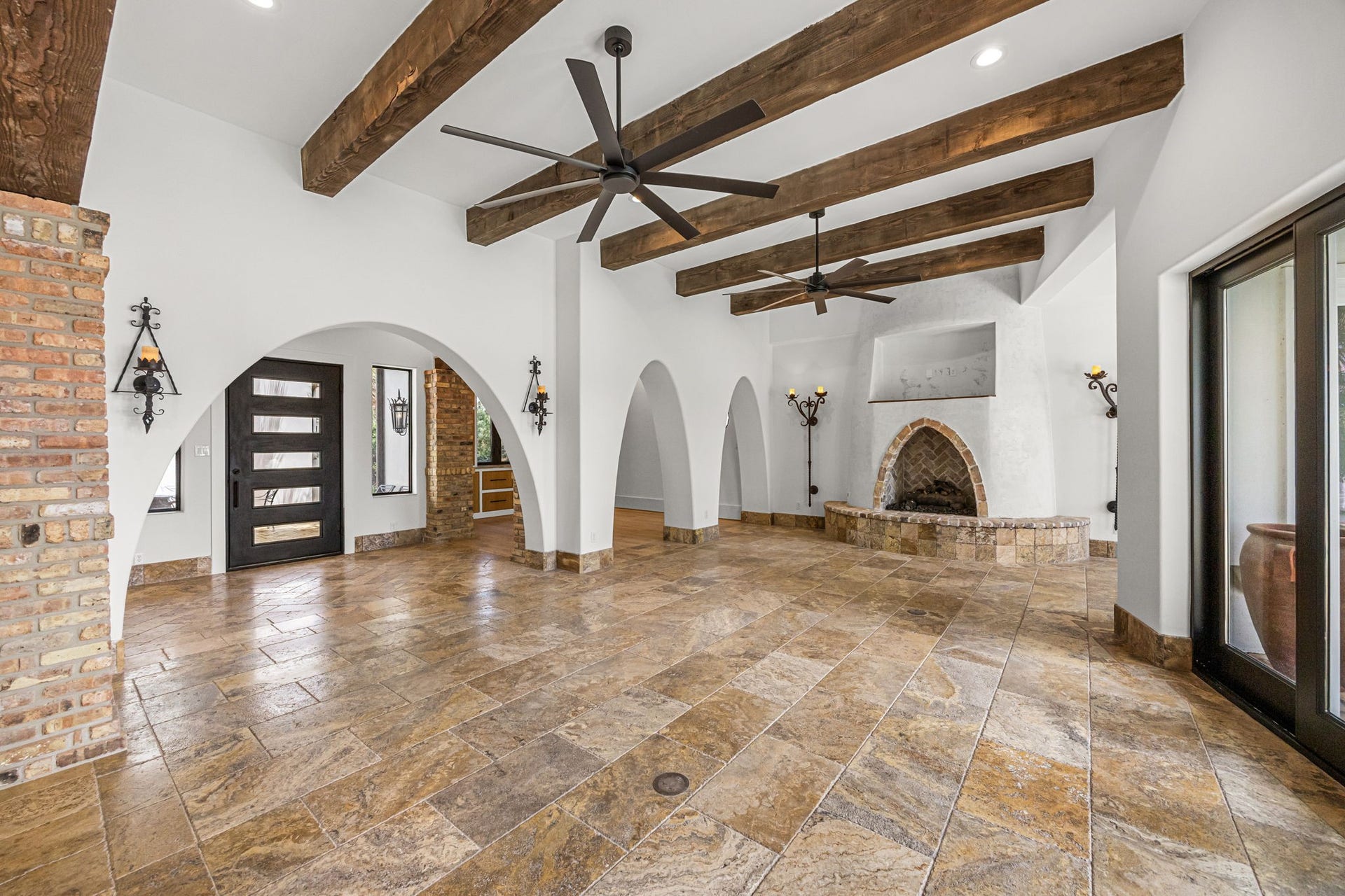 721 Harborside Way, League City, TX 77565 Looking toward the entry, the home's impressive scale is on full display, enhanced by soaring ceilings and thoughtfully curated finishes.
