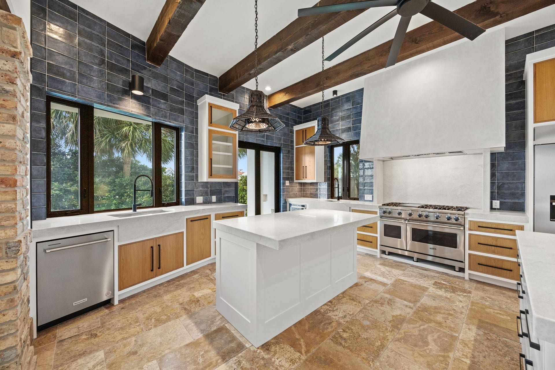 721 Harborside Way, League City, TX 77565 The kitchen is richly layered with exceptional design accents, creating a visually stunning and highly detailed space.
