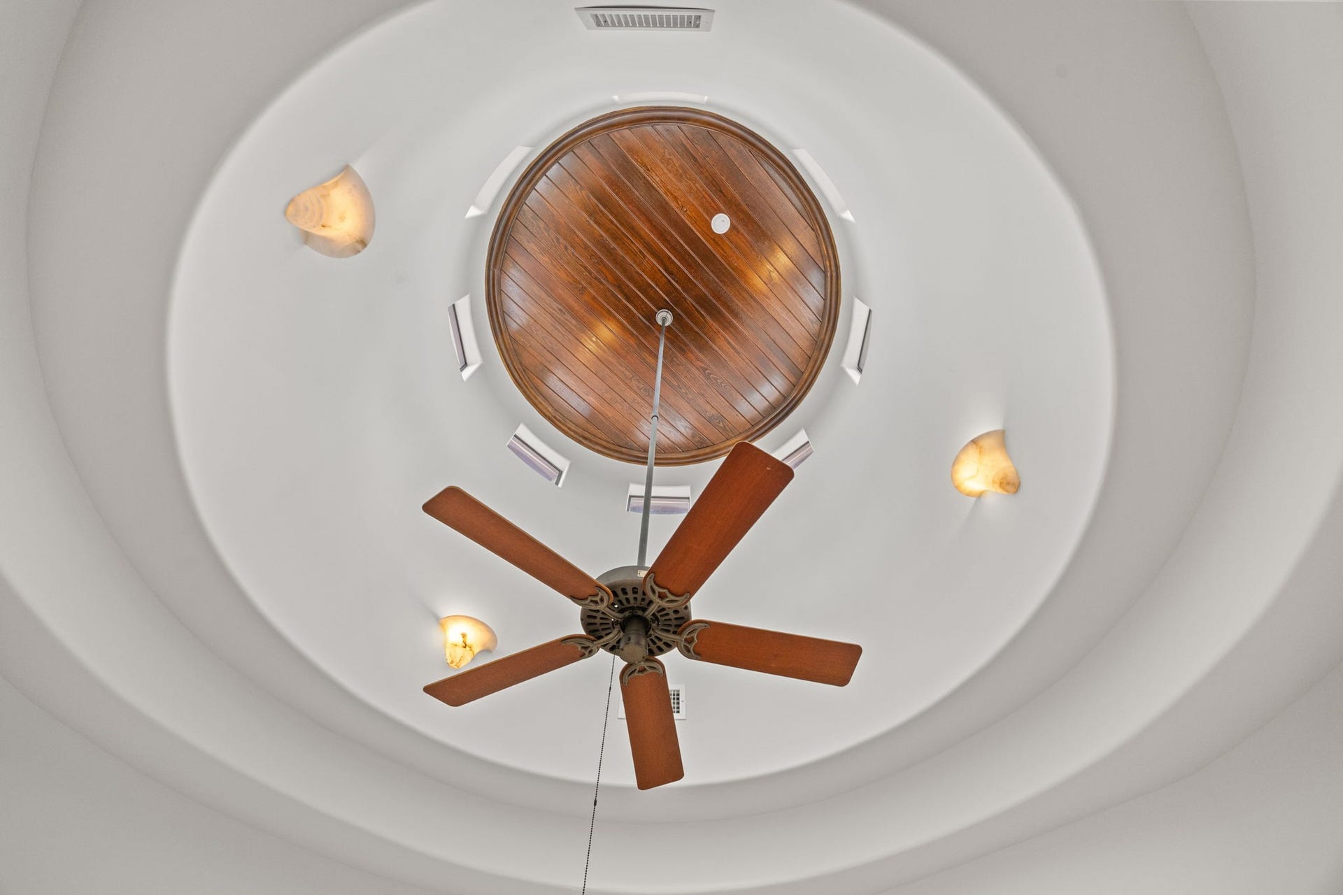 721 Harborside Way, League City, TX 77565 Above the staircase, a beautifully crafted rotunda ceiling adds height, drama, and timeless architectural elegance.