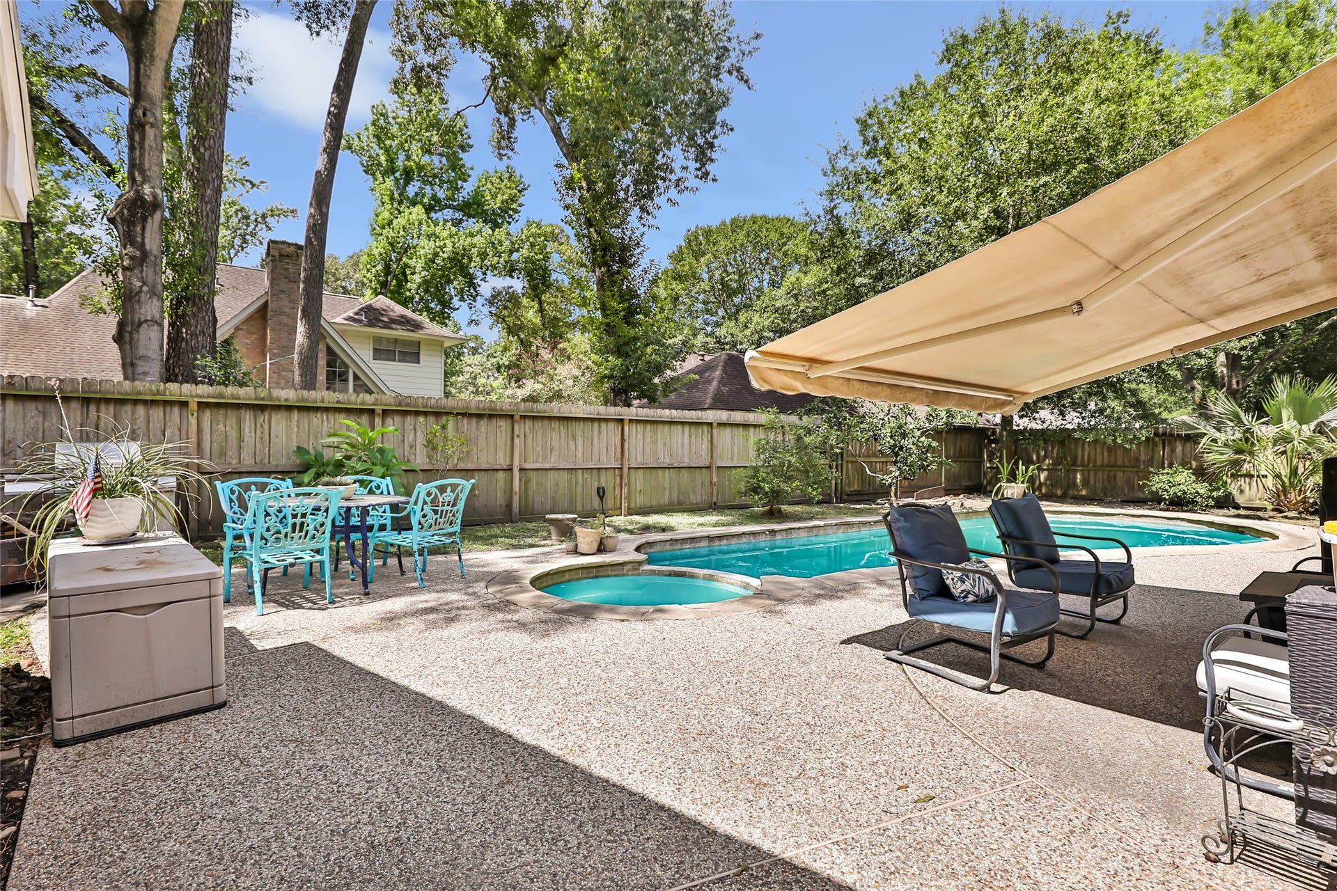 3714 Swift Creek Drive, Kingwood, TX 77339 Beautiful pool and retractable awning for extra shade.