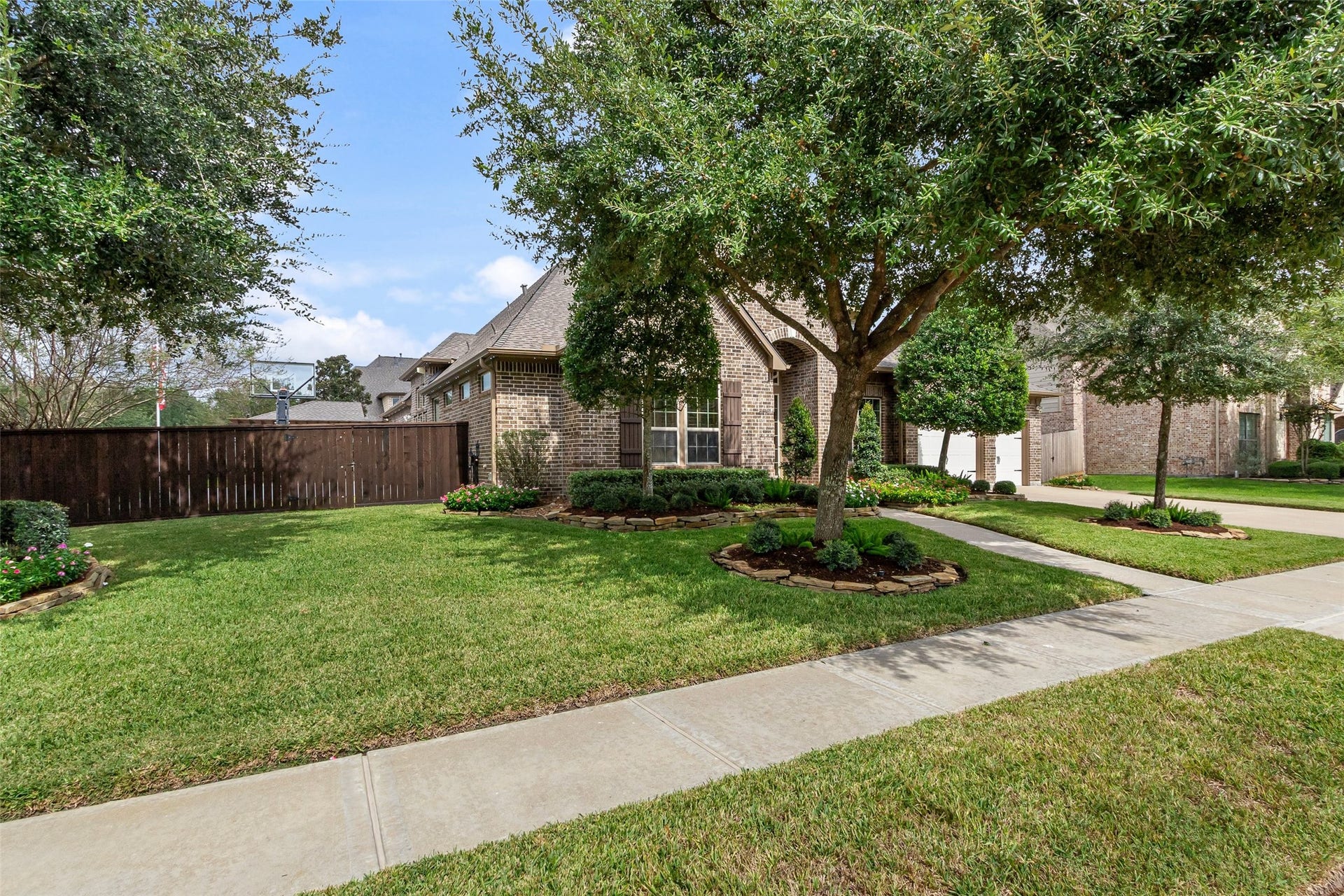 21114 W Kelsey Creek Trail, Cypress, TX 77433 A view of the front from the left corner. Notice the fence which was replaced in 2022 with the East side replaced in 2026.
