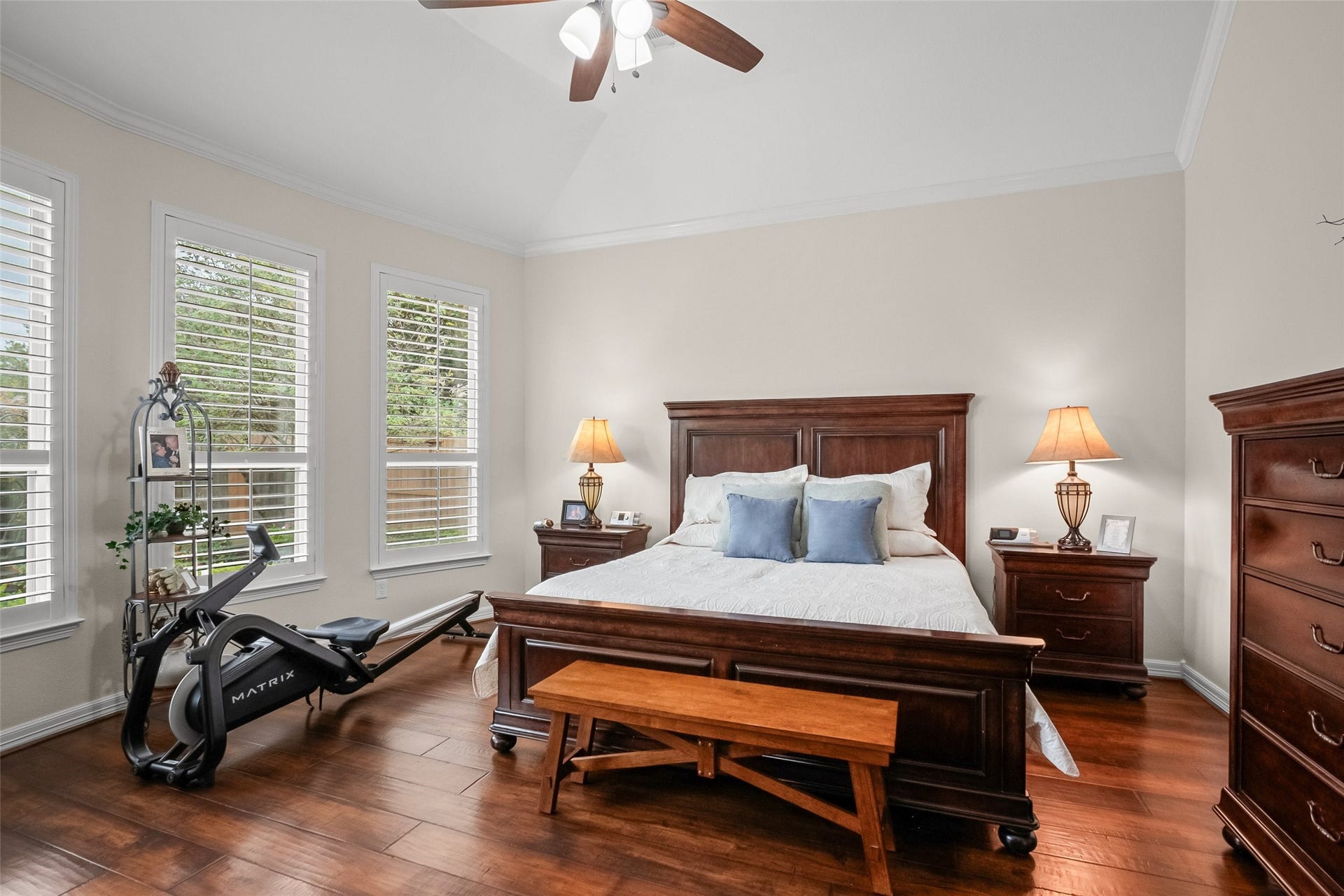 21114 W Kelsey Creek Trail, Cypress, TX 77433 Large primary bedroom with numerous windows overlooking the backyard.
