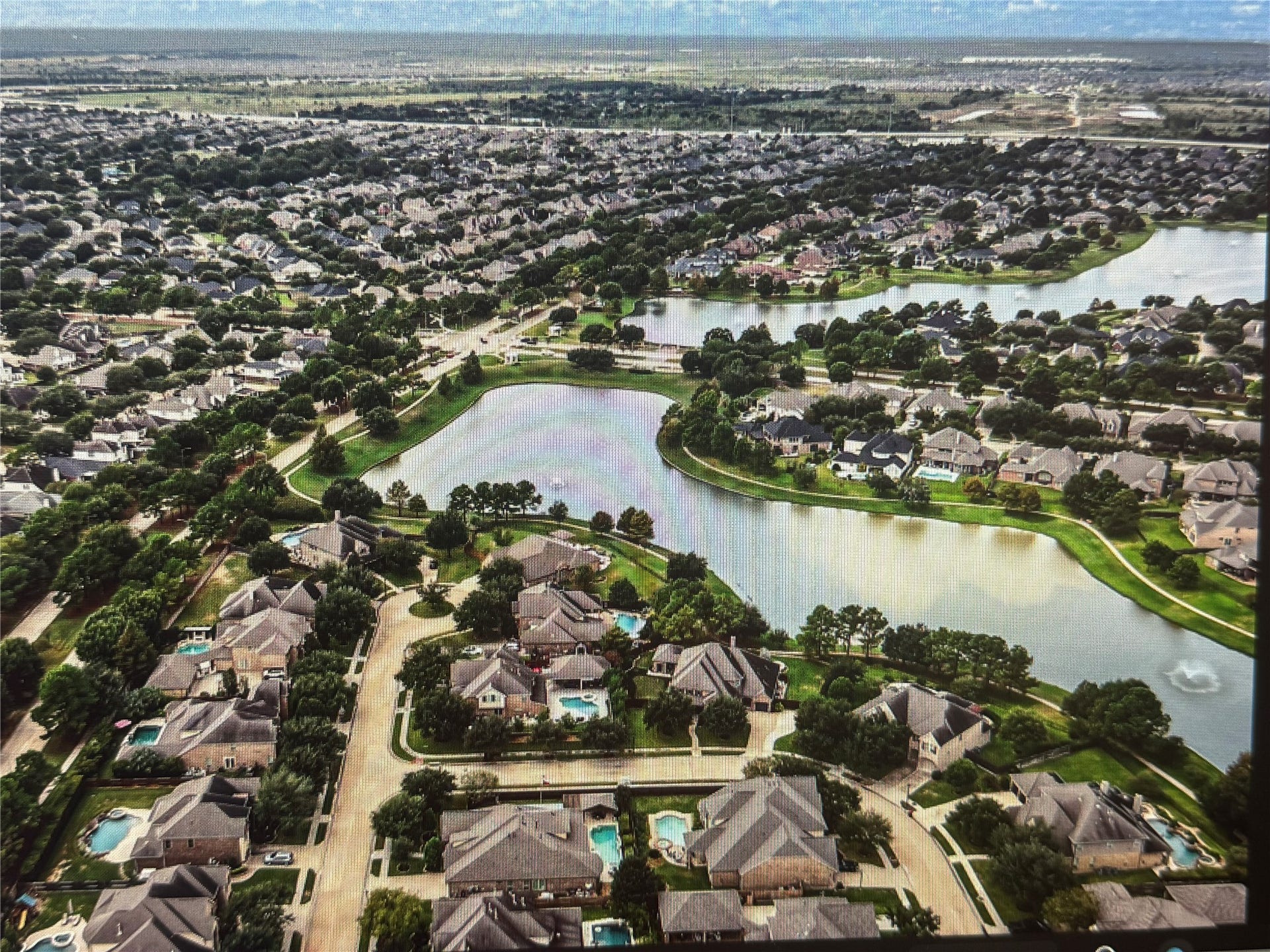 21114 W Kelsey Creek Trail, Cypress, TX 77433 Another view of the two lakes near the home. This neighborhood is gorgeous and has so much to offer residents.