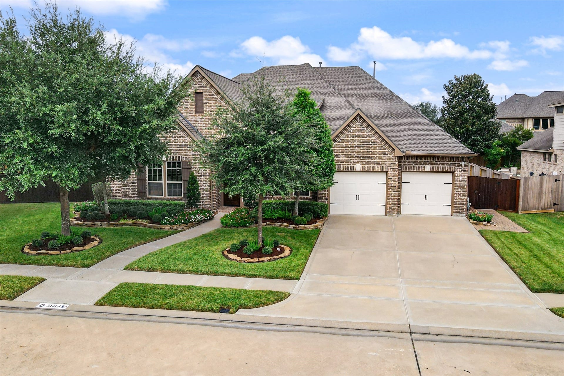 21114 W Kelsey Creek Trail, Cypress, TX 77433 Another view of the front of the home. Both of the garage doors have exterior keypads for a quick open when needed.