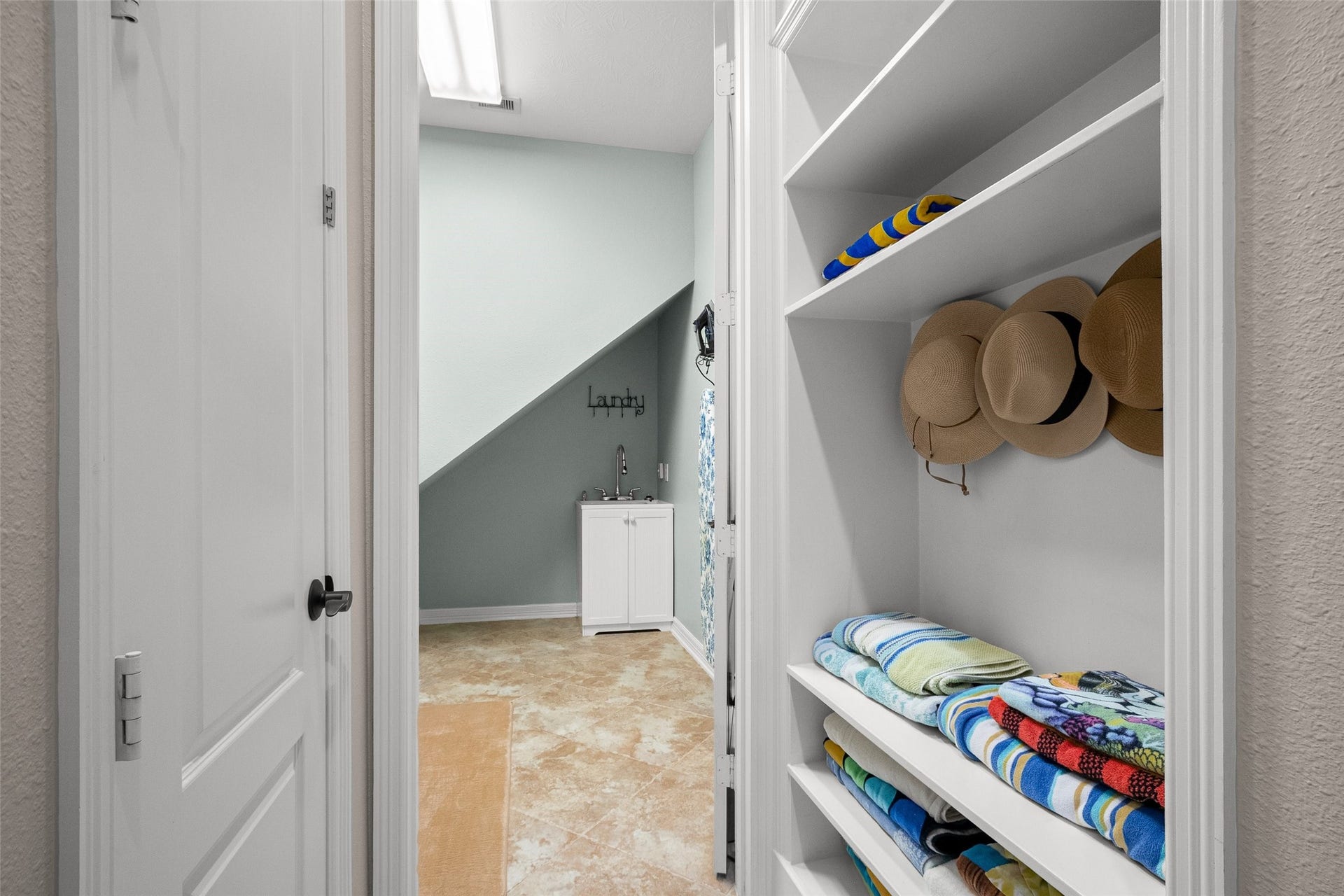 21114 W Kelsey Creek Trail, Cypress, TX 77433 Mud room sits just outside the laundry room, and currently used for pool towels/hats.