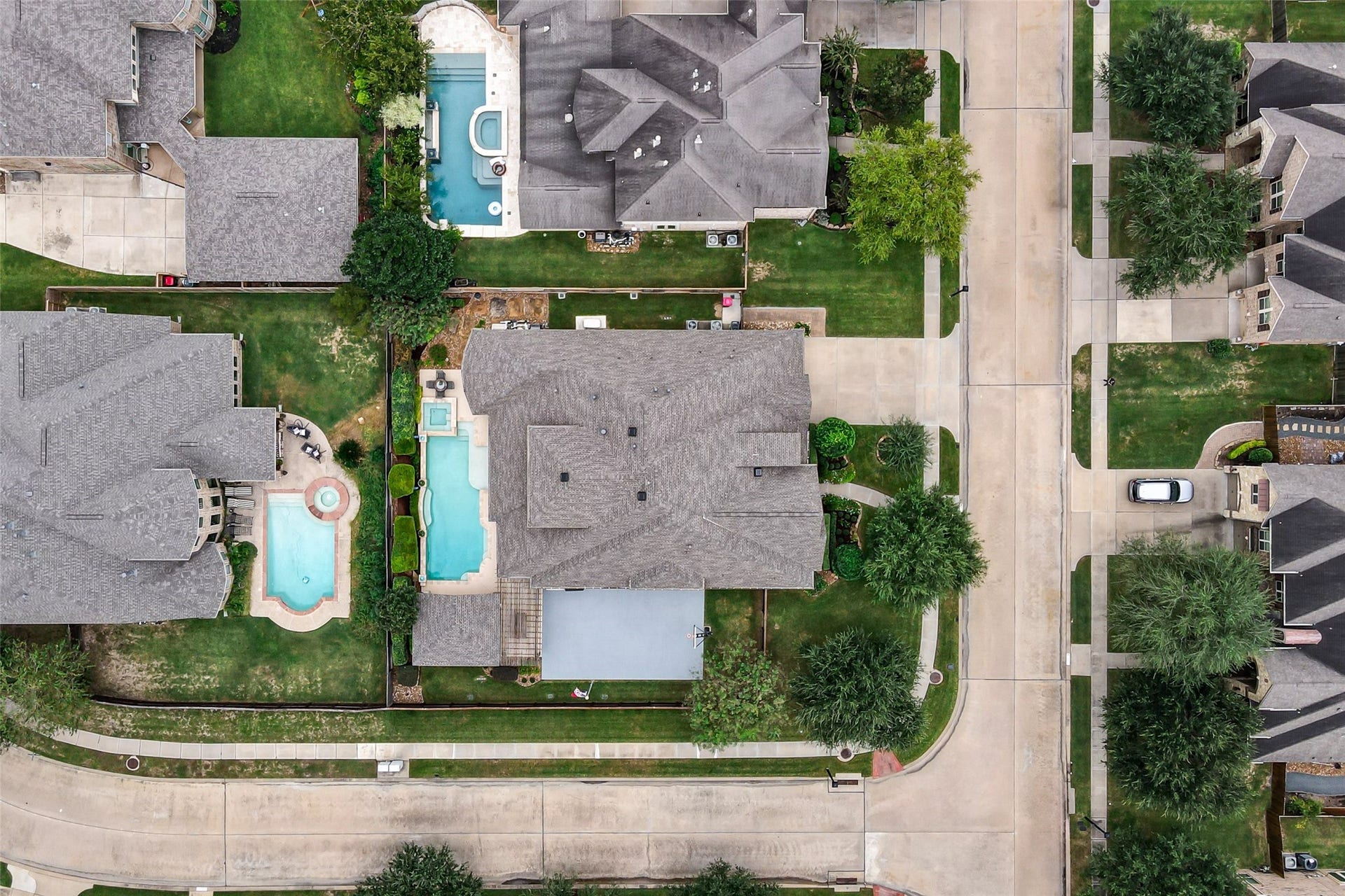 21114 W Kelsey Creek Trail, Cypress, TX 77433 Another aerial shot looking down over the top of the property. Great shot of the new roof with a lifetime (limited) warranty installed 7/2026 with transferrable warranty.