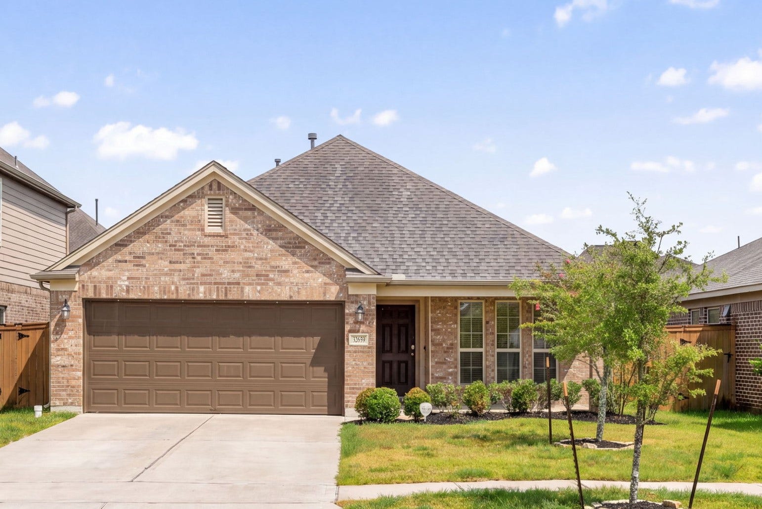 32659 Timber Point Drive, Brookshire, TX 77423 Welcome to 32659 Timber Point, located in the desirable Vanbrooke community! This one-story home offers a great location and inviting curb appeal, featuring a brick exterior, well-manicured landscaping, and a two-car garage.