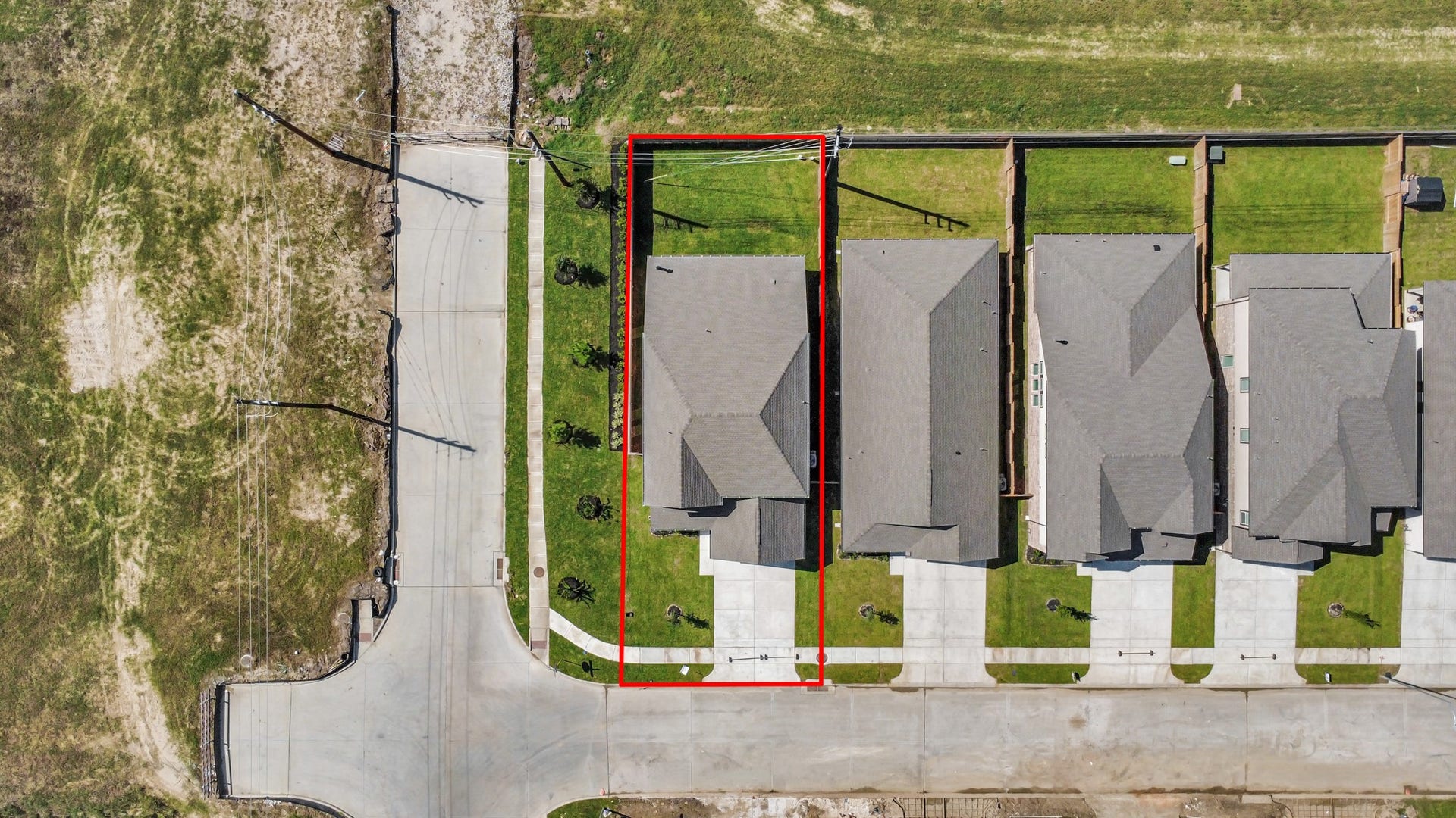 11103 Tulip Ridge Trail, Houston, TX 77044 An aerial view of a spacious subdivision lot, highlighting a well-maintained yard and a fully fenced perimeter, offering both privacy and expansive outdoor space.