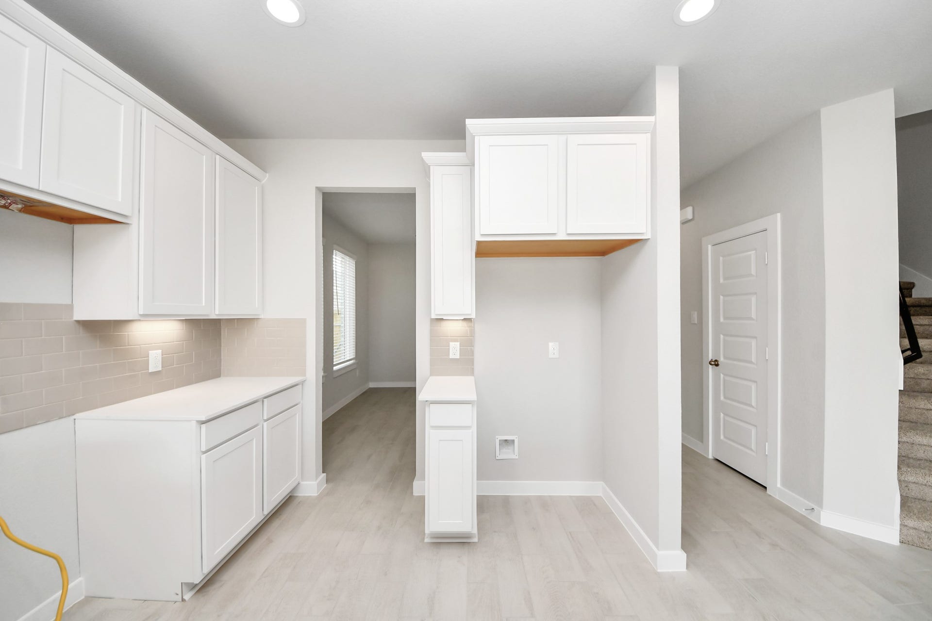 11103 Tulip Ridge Trail, Houston, TX 77044 This generously spacious kitchen is a dream realized! Sample photo of completed home with similar floor plan. Actual colors and selections may vary.