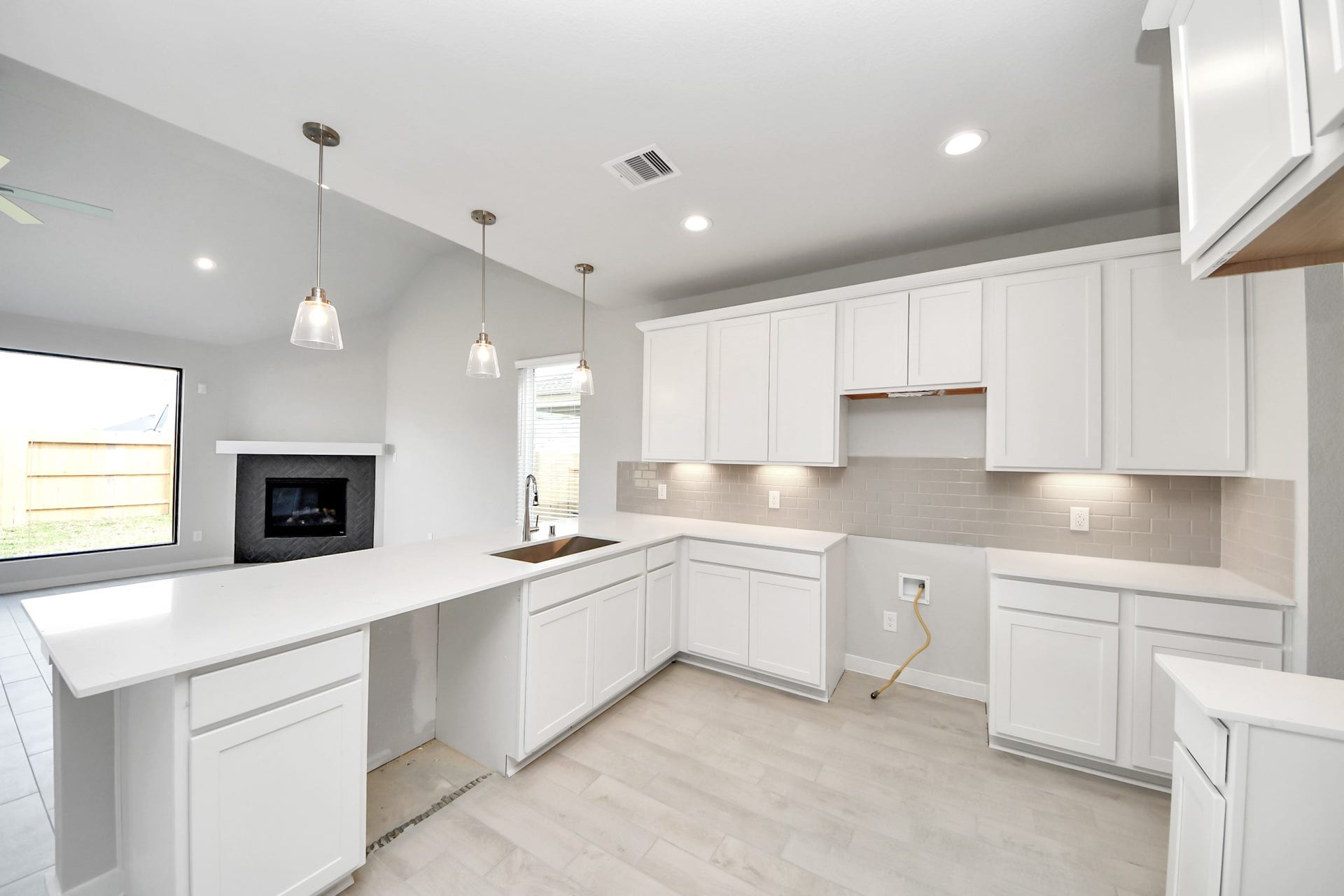 11103 Tulip Ridge Trail, Houston, TX 77044 All of this overlooks your expansive family room, creating a perfect space for culinary delights and family gatherings. Sample photo of completed home with similar floor plan. Actual colors and selections may vary.