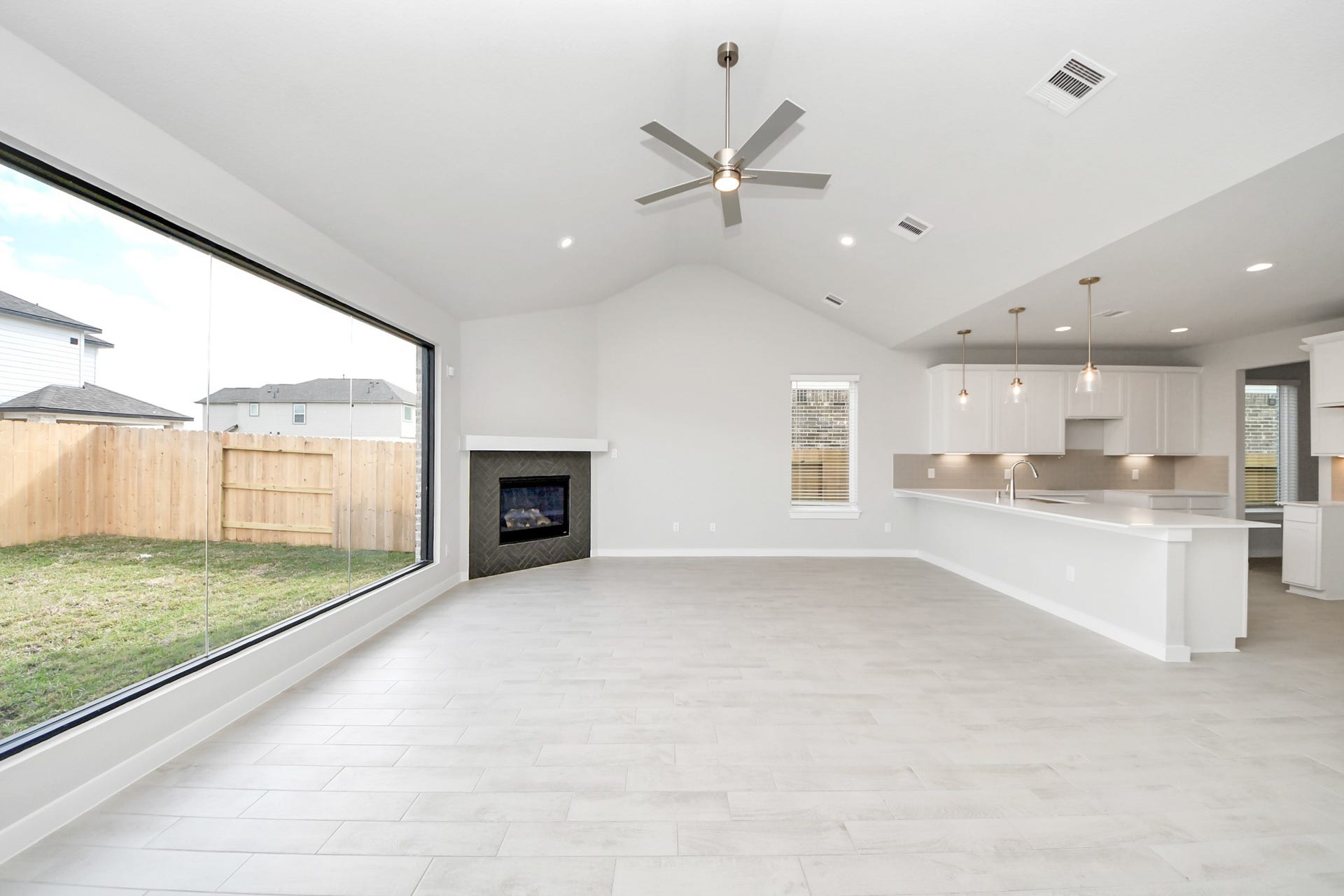 11103 Tulip Ridge Trail, Houston, TX 77044 Take another glimpse into the heart of the home with this additional view of the family rooma sprawling space ready to accommodate all your gatherings. Sample photo of completed home with similar floor plan. Actual colors and selections may vary.