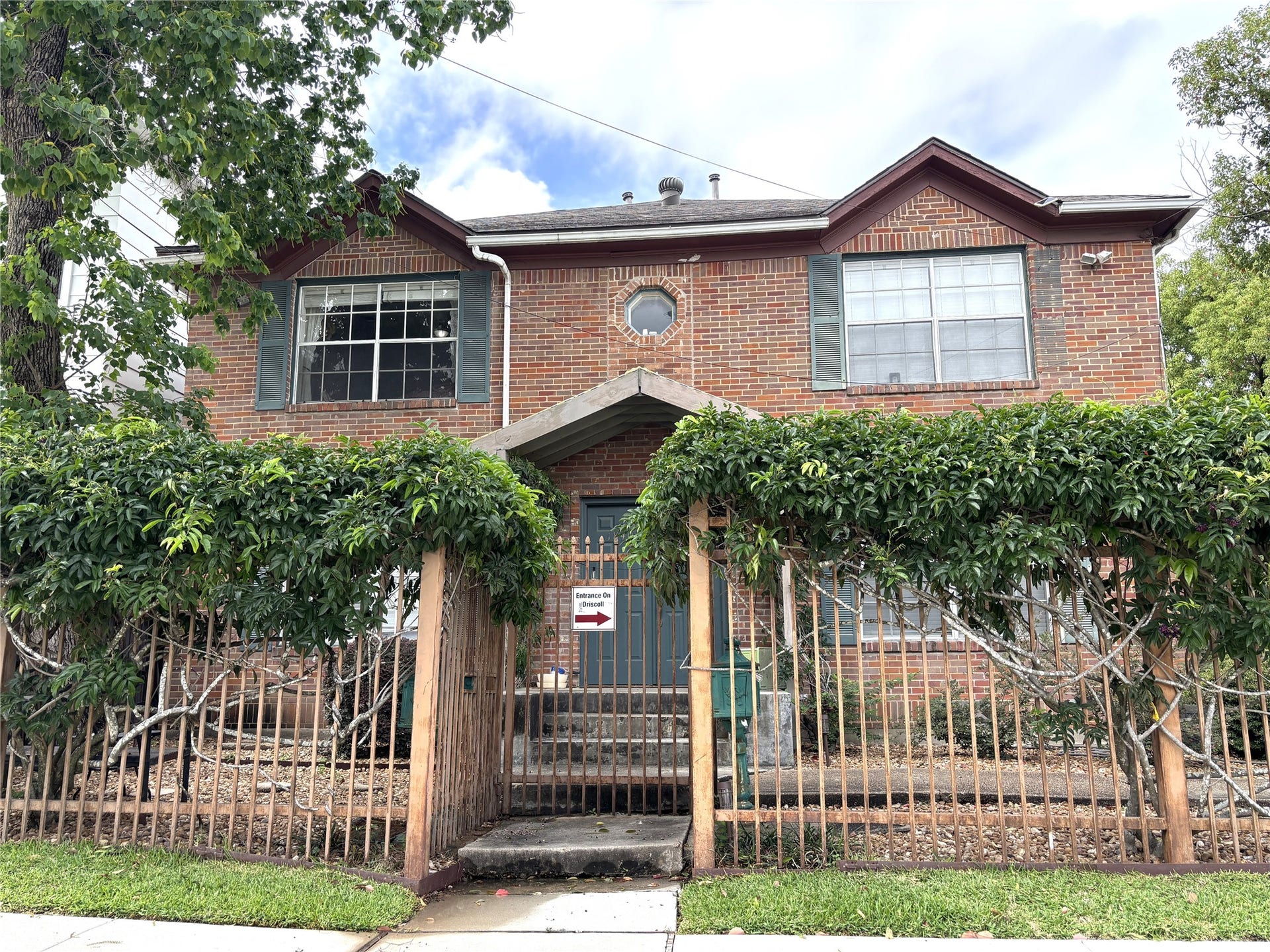 1840 Branard Street, #3, Houston, TX 77098 Front of fourplex from in front of the gate.