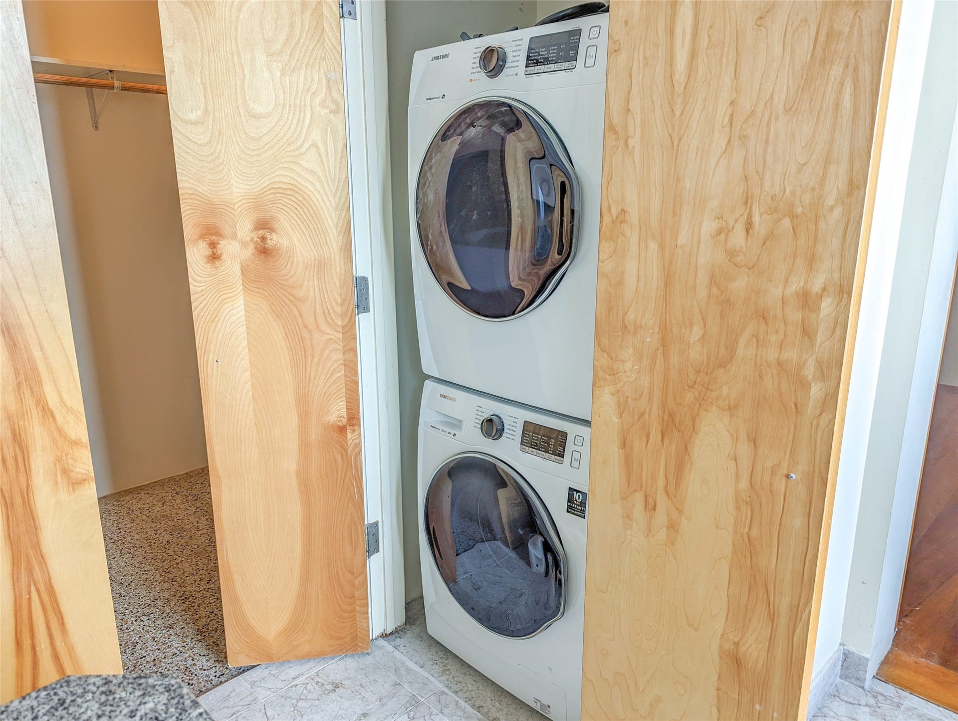 New and stacked washer and dryer in-unit (stays with lease)
