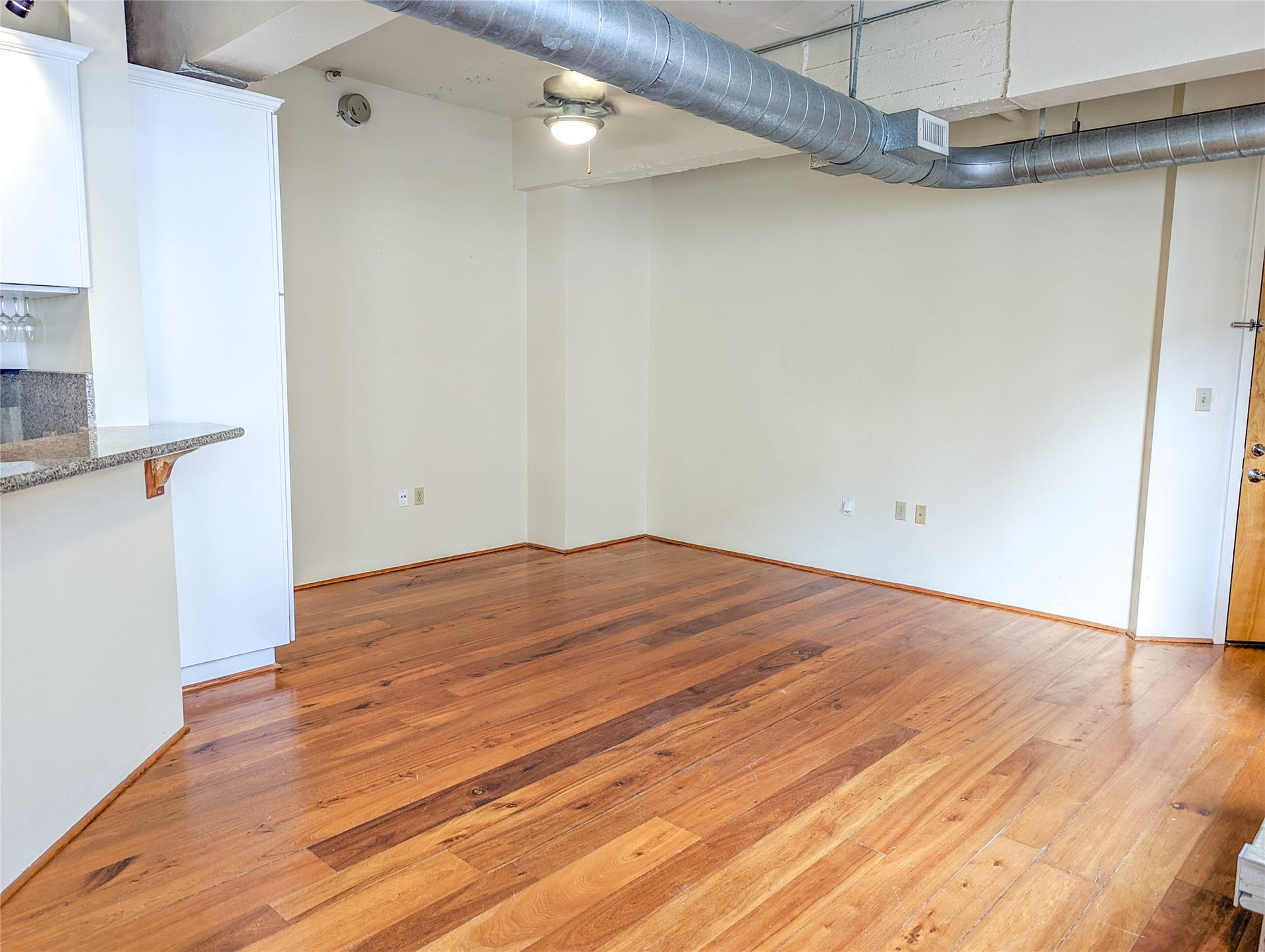 Seamless transition to living room (bookshelf not included)