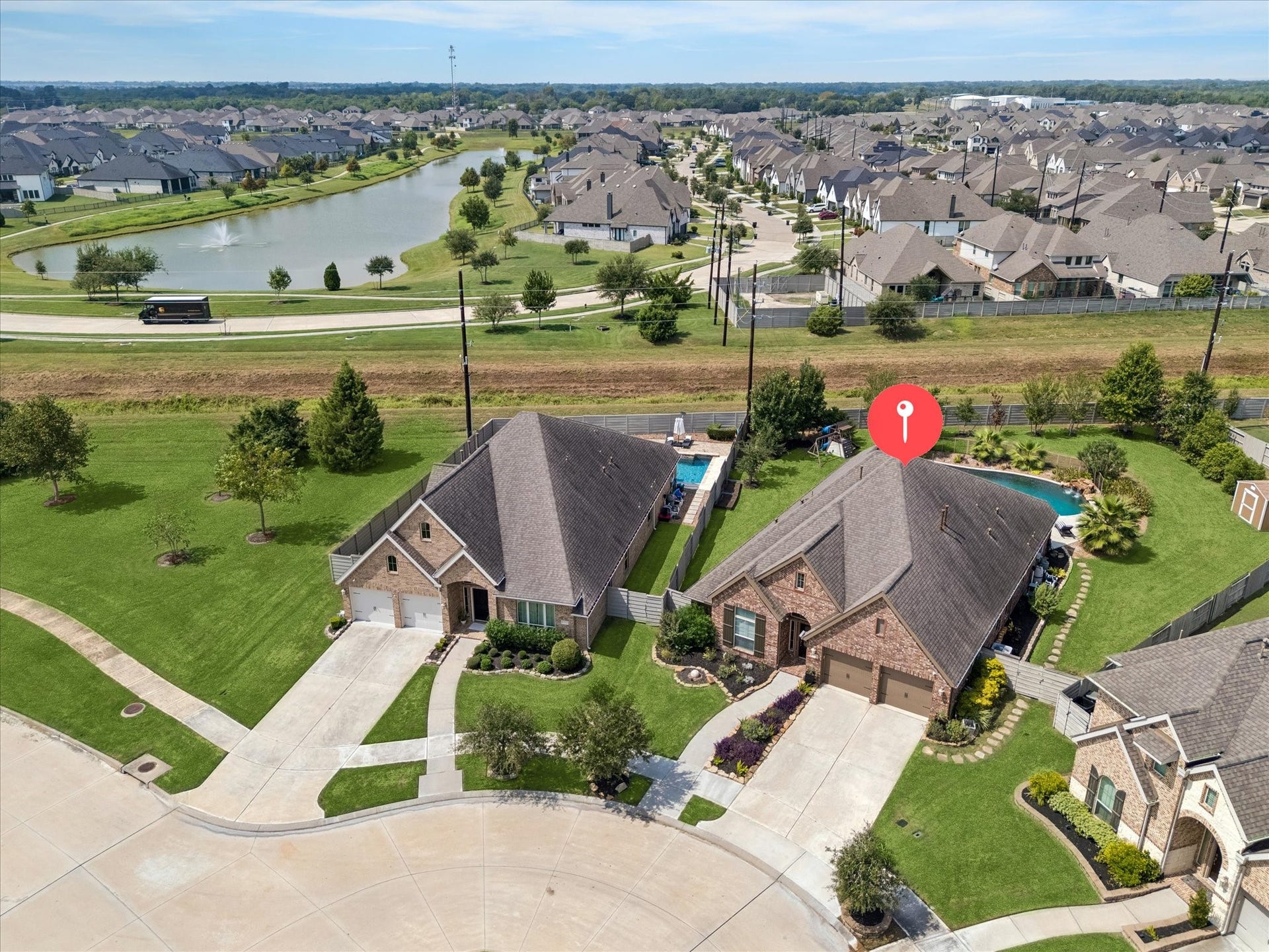 No back neighbors and easy access to walking trails and extra green space. You can also see the dedicated pavers around the side of the home for easy accessibility. Tell those pool party guests to just come on back!