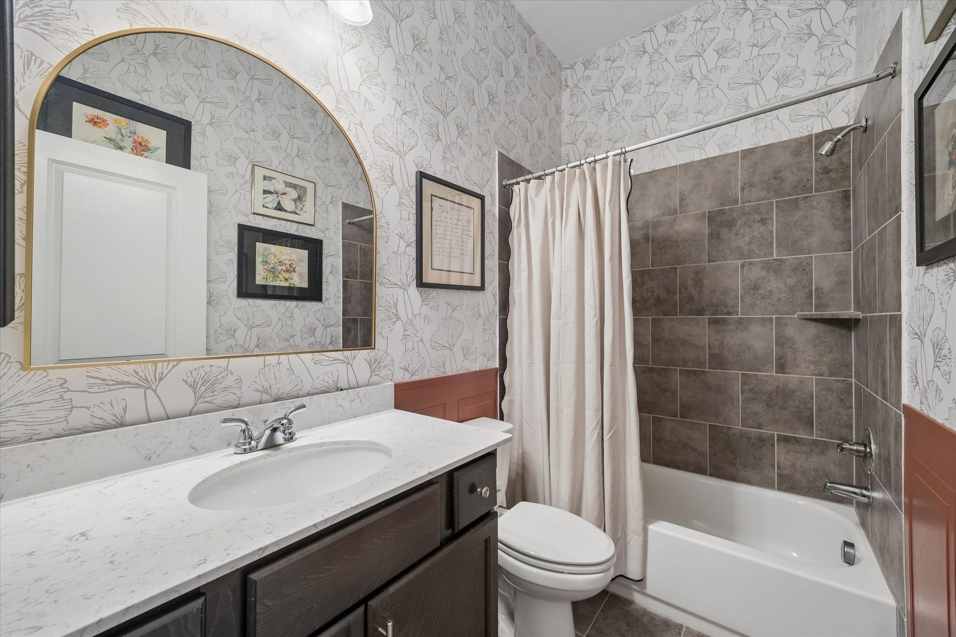 Beautiful hall bathroom between two of the seconary bedrooms.