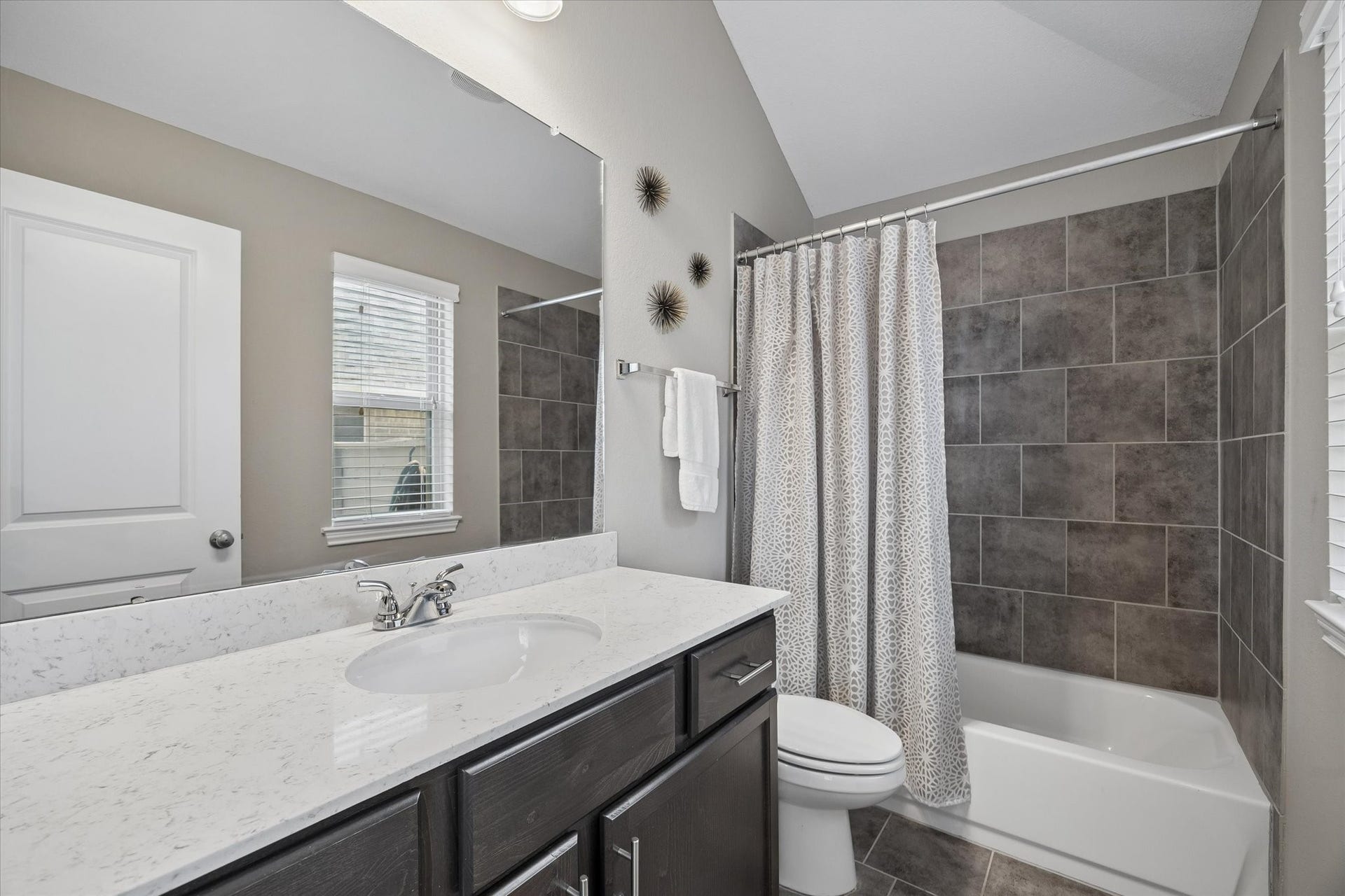 The hall bath near the third bedroom. Perfect for a guest bathroom!