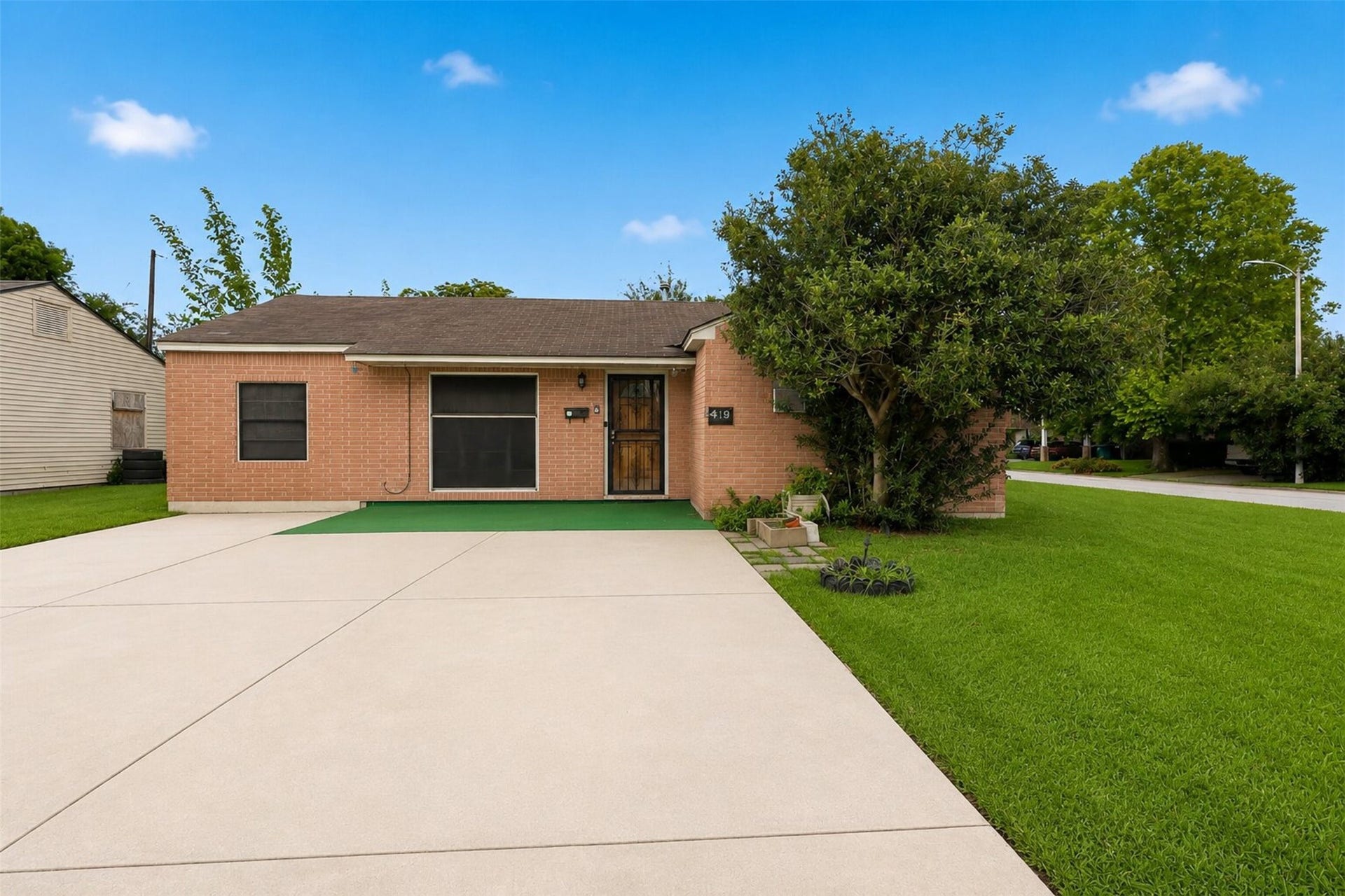 Low maintenance brick exterior with a warm, welcoming feel