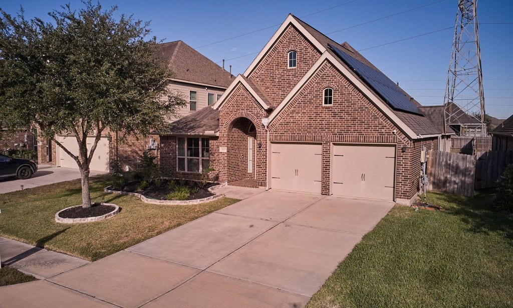 Beautiful Brick Exterior & Welcoming Entry!