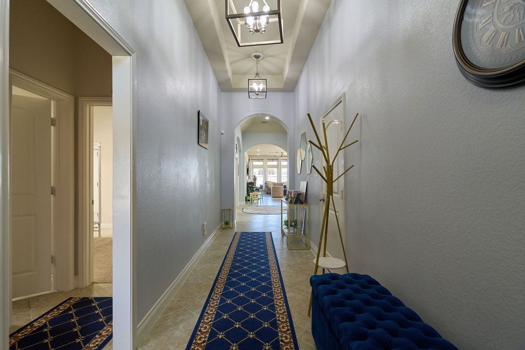 Grand Entryway with Soaring Ceilings!