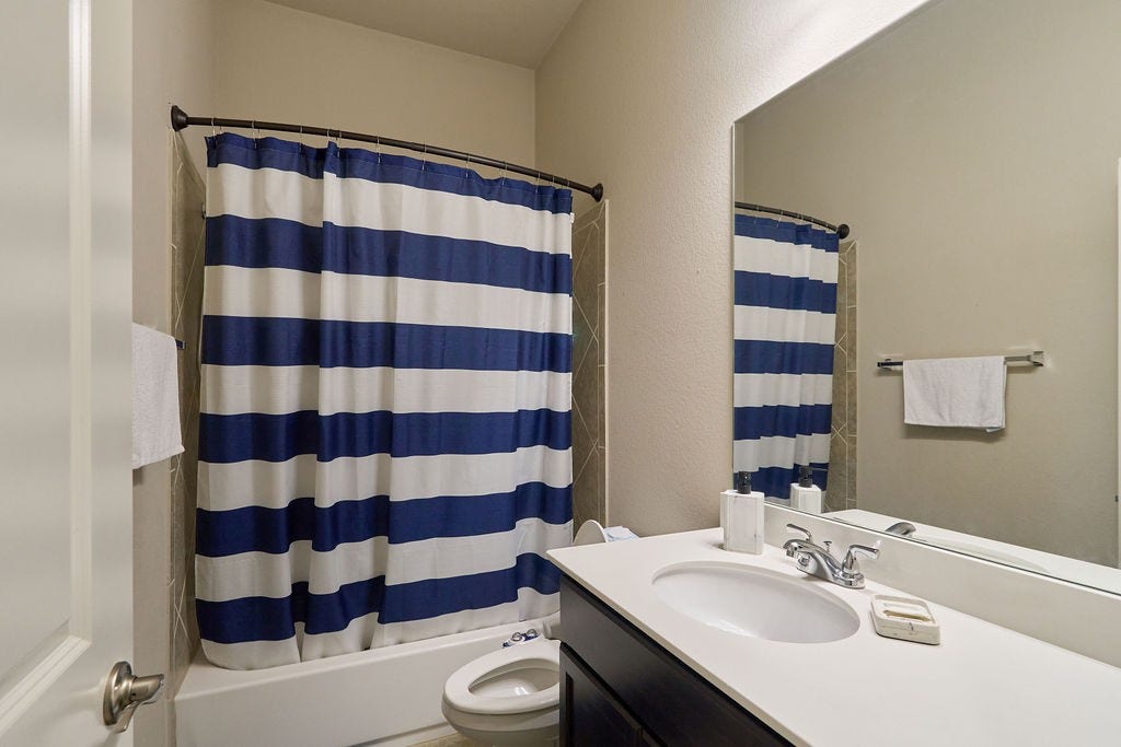 Beautifully Finished Bathroom with Dual Vanities!