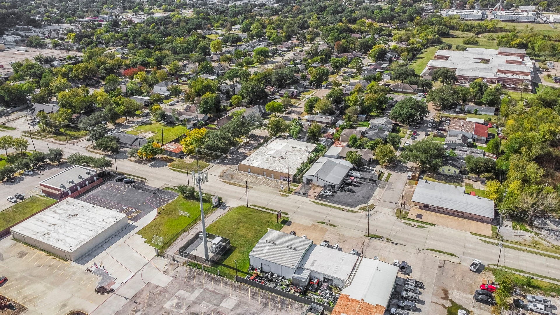 1018 Shaver Street, Pasadena, TX 77506 Top-down view emphasizing the propertys footprint and ample surrounding space.
