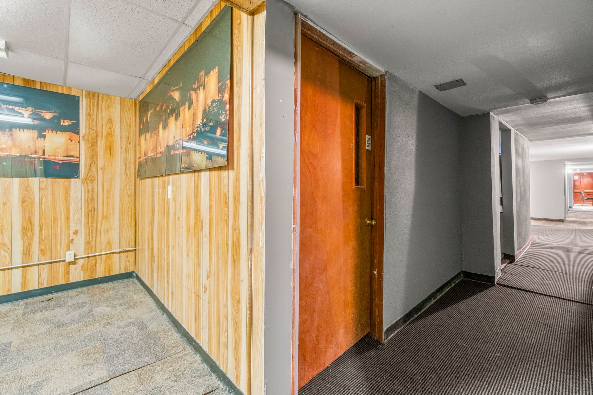 1018 Shaver Street, Pasadena, TX 77506 Additional office or storage room with wood panel detailing.