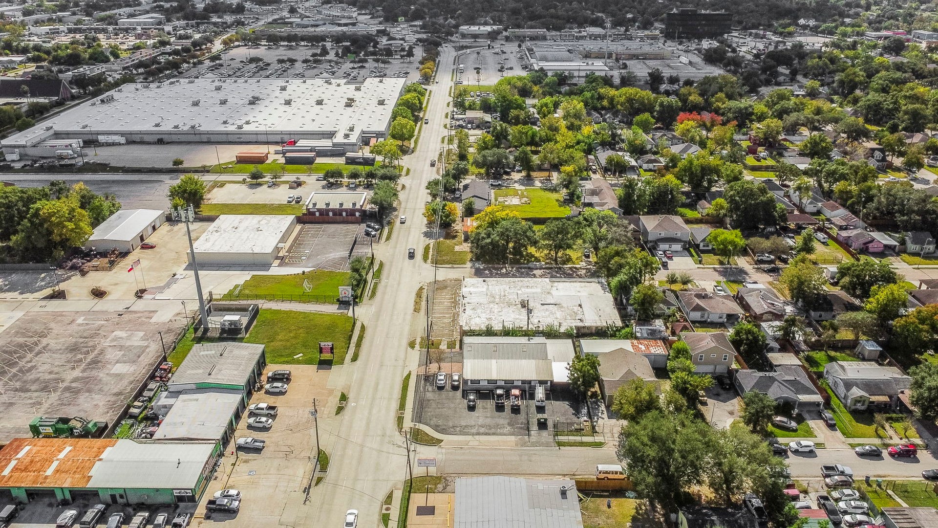 1018 Shaver Street, Pasadena, TX 77506 Aerial look at nearby retail, industrial, and residential developments.
