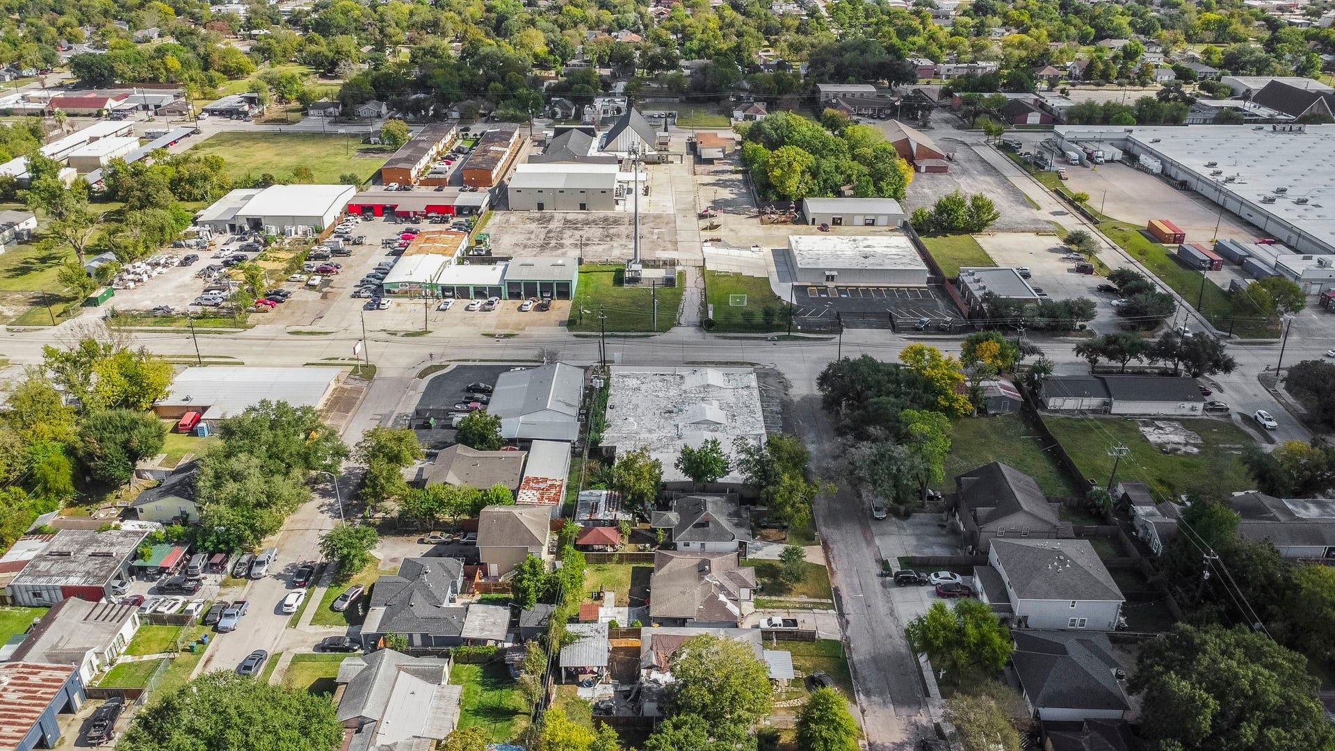 1018 Shaver Street, Pasadena, TX 77506 High-angle view displaying surrounding homes, businesses, and major access roads.