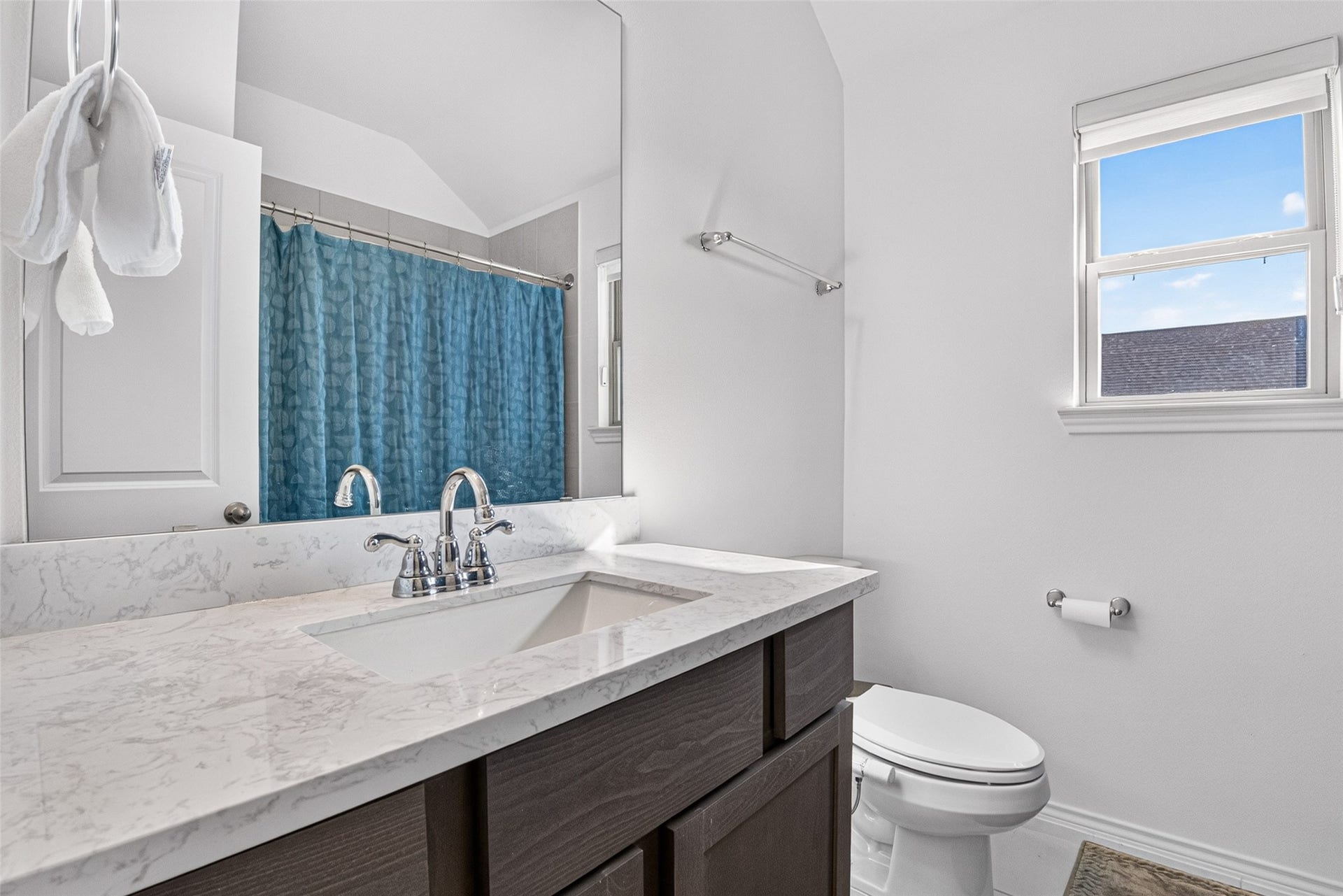 1315 Munson Valley Road, Richmond, TX 77406 Bright and inviting bathroom featuring a spacious vanity and elegant marble-look countertop.