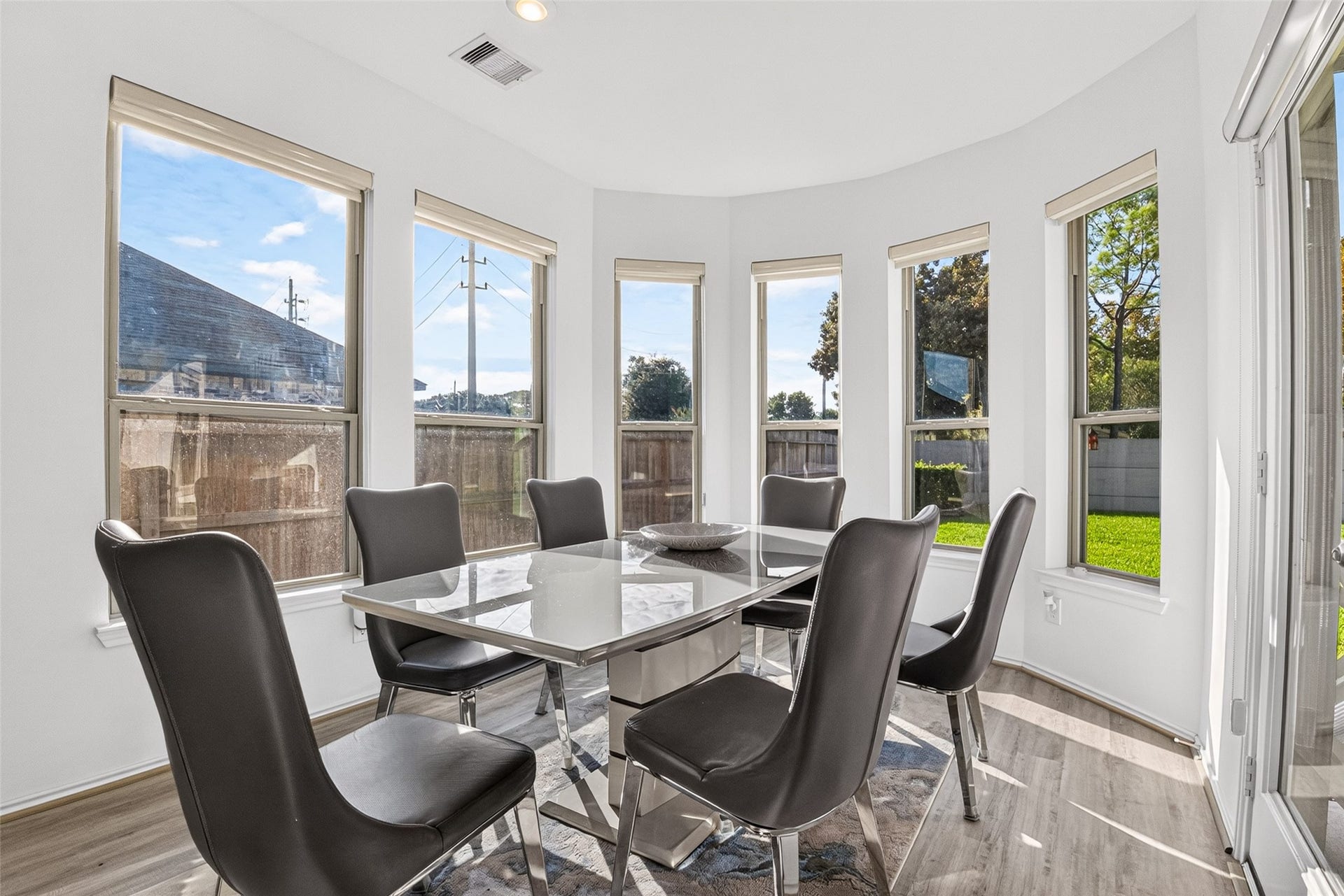 1315 Munson Valley Road, Richmond, TX 77406 Bright and inviting breakfast area featuring a beautiful curved wall of windows.