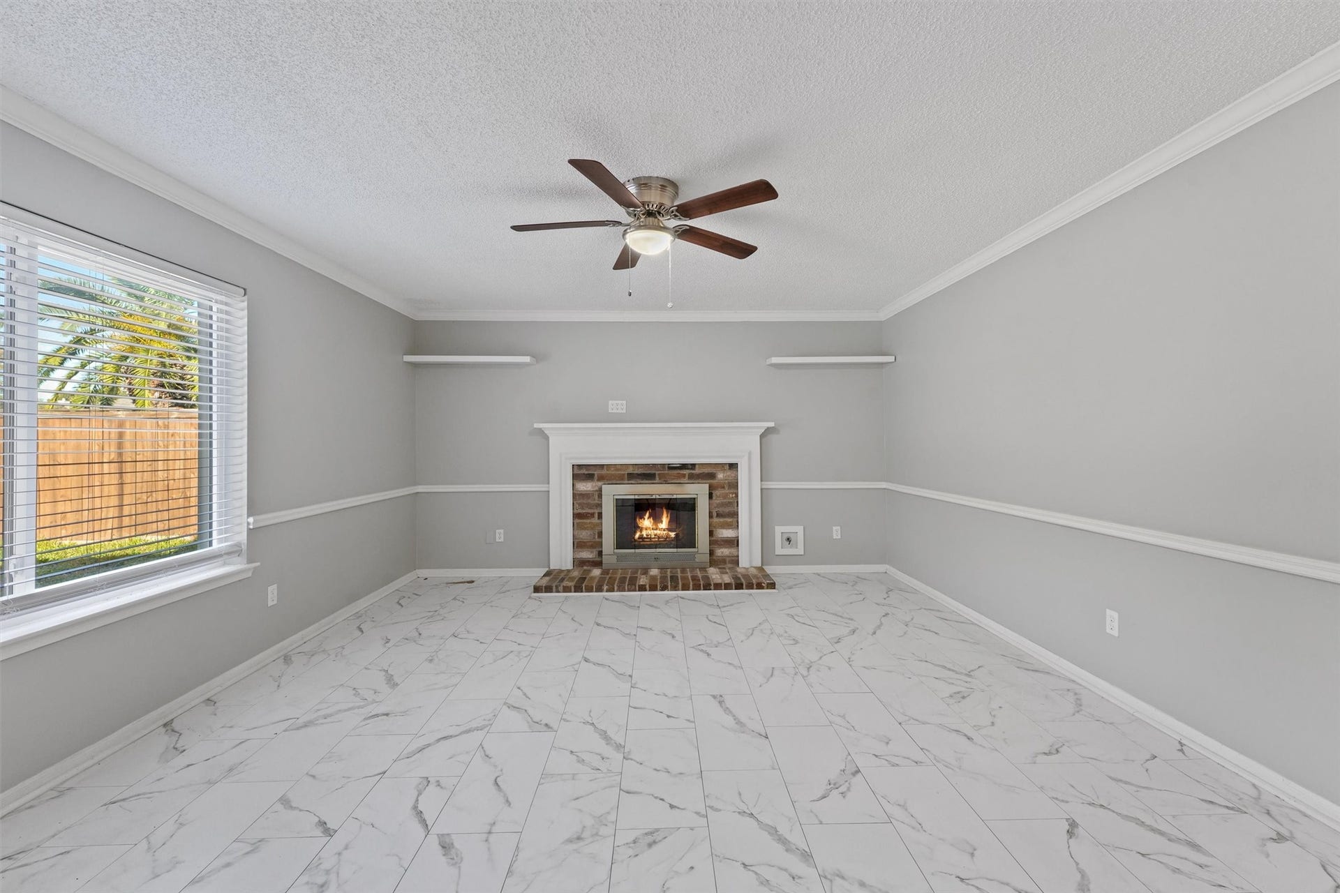 Experience the epitome of comfort and style in this spacious living room, where abundant natural light and an open layout create the perfect ambiance for relaxation and entertaining. Your dream home awaits!"