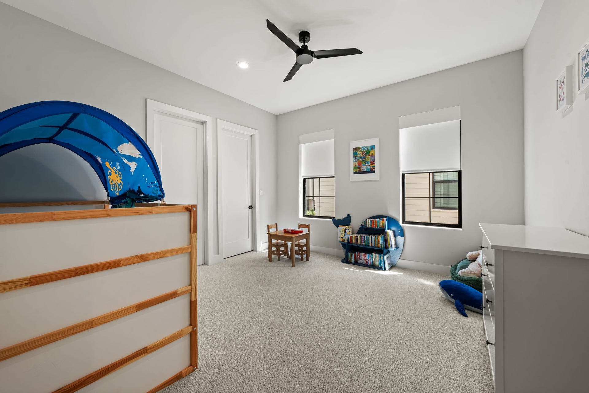733 E 10th 1/2 Street, Houston, TX 77008 This secondary bedroom offers generous proportions, natural light, and a calm neutral palette. Its upper-level placement provides privacy away from the main gathering spaces.