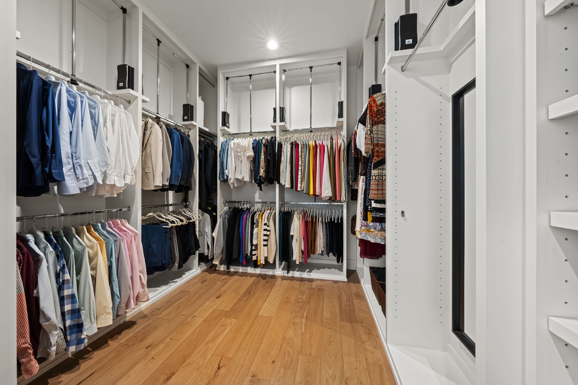 733 E 10th 1/2 Street, Houston, TX 77008 The boutique-style walk-in closet offers extensive hanging space, shelving, and built-in organization. Its generous layout keeps wardrobes and accessories beautifully arranged.