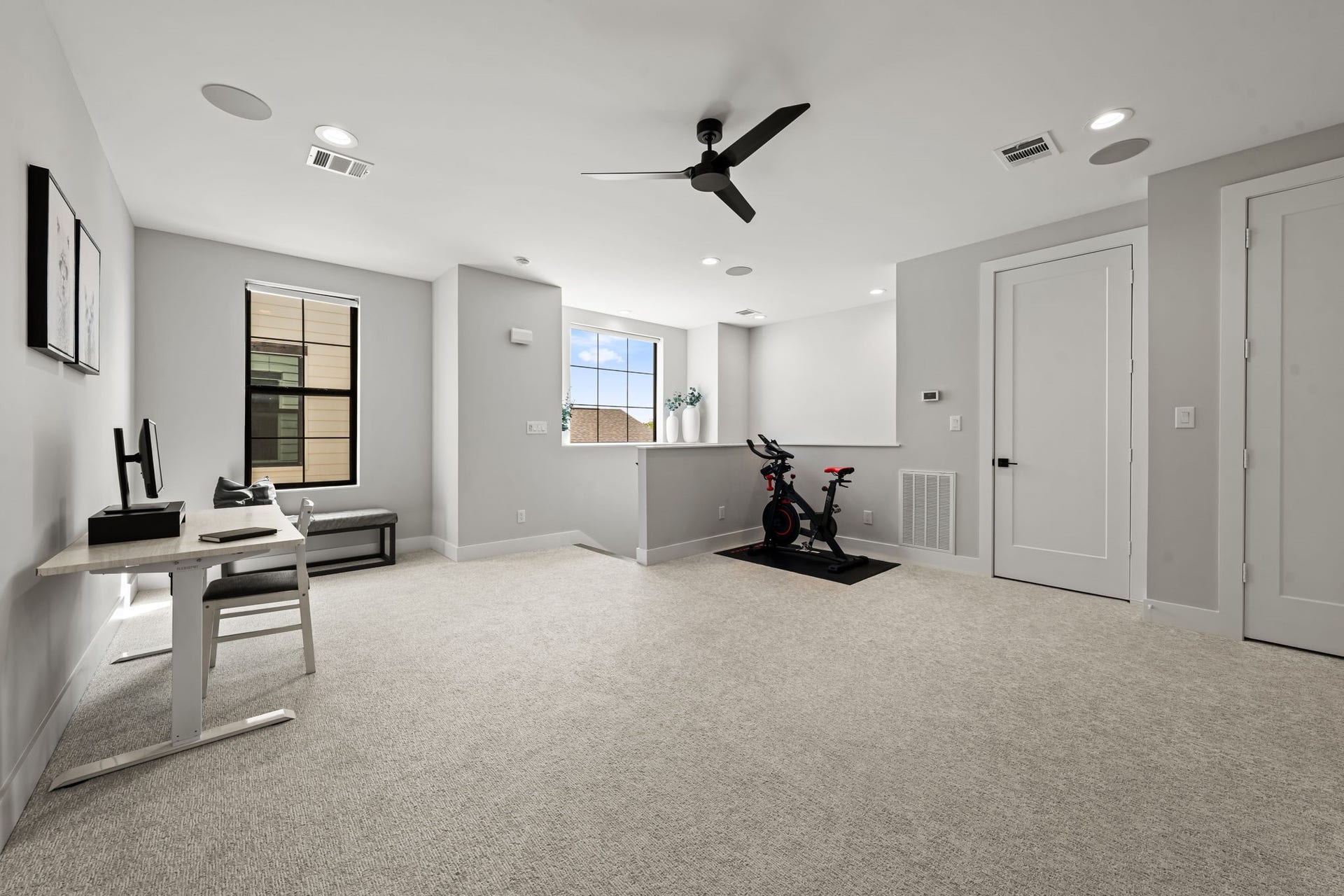 733 E 10th 1/2 Street, Houston, TX 77008 Generous dimensions and a bright neutral palette make the game room easy to personalize. The third-floor location creates separation from the home's quieter bedroom level.