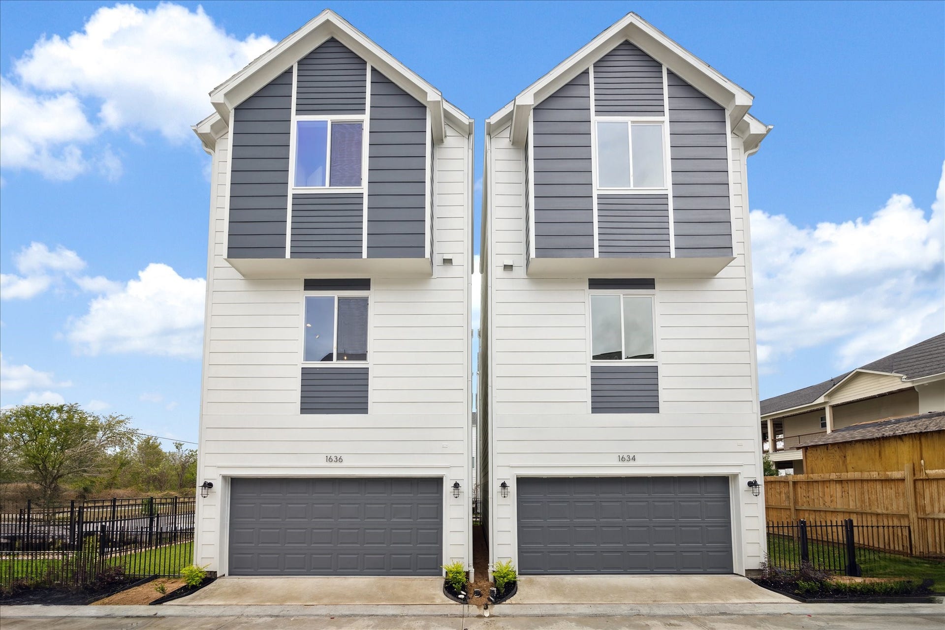 Modern exterior with private entry & two-car garage