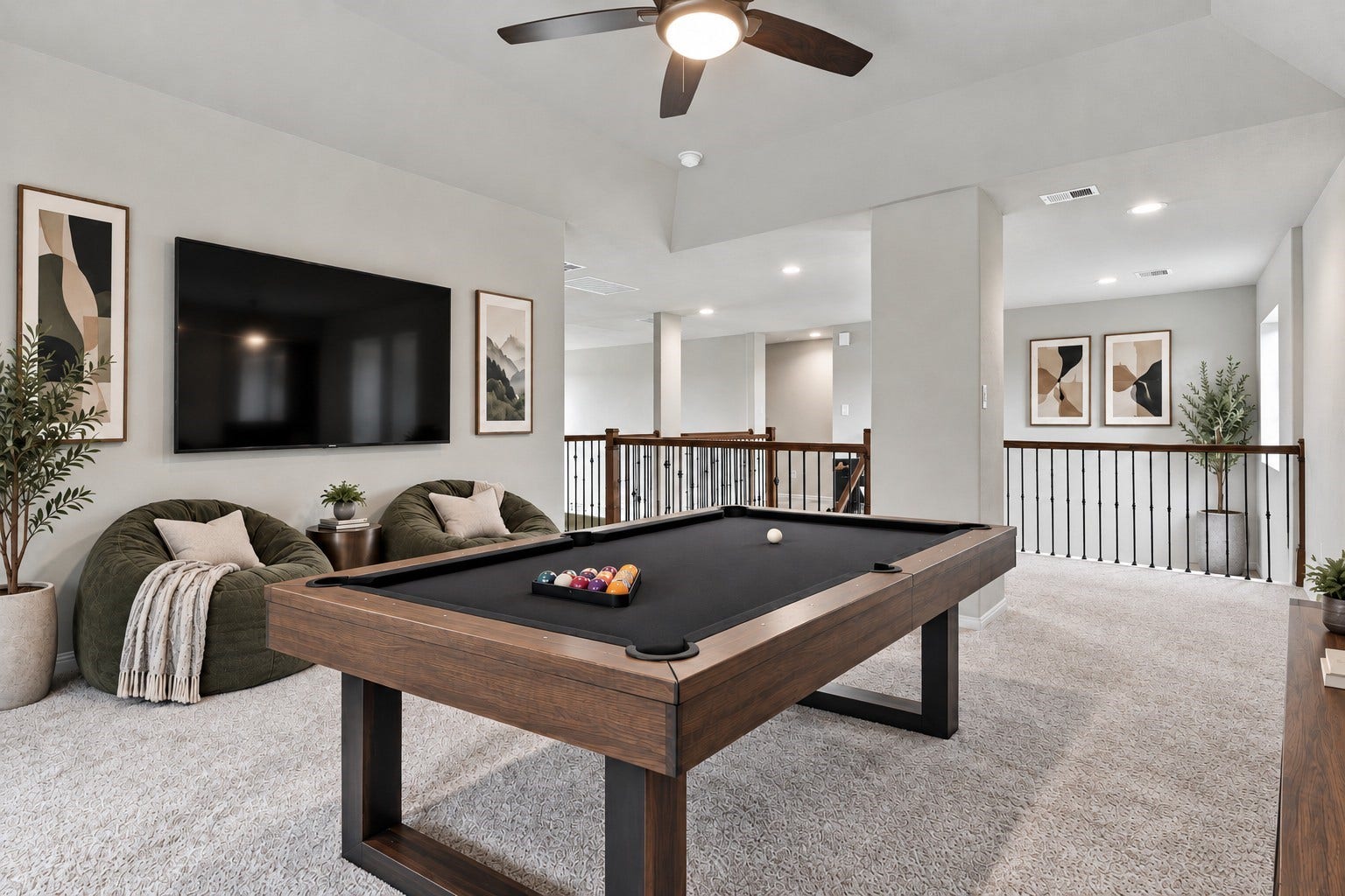 24115 Lake Molveno Drive, Katy, TX 77493 Virtually Staged: Highlighting a smart balance of open design and functional layout, this game lounge serves as a versatile upstairs retreat.