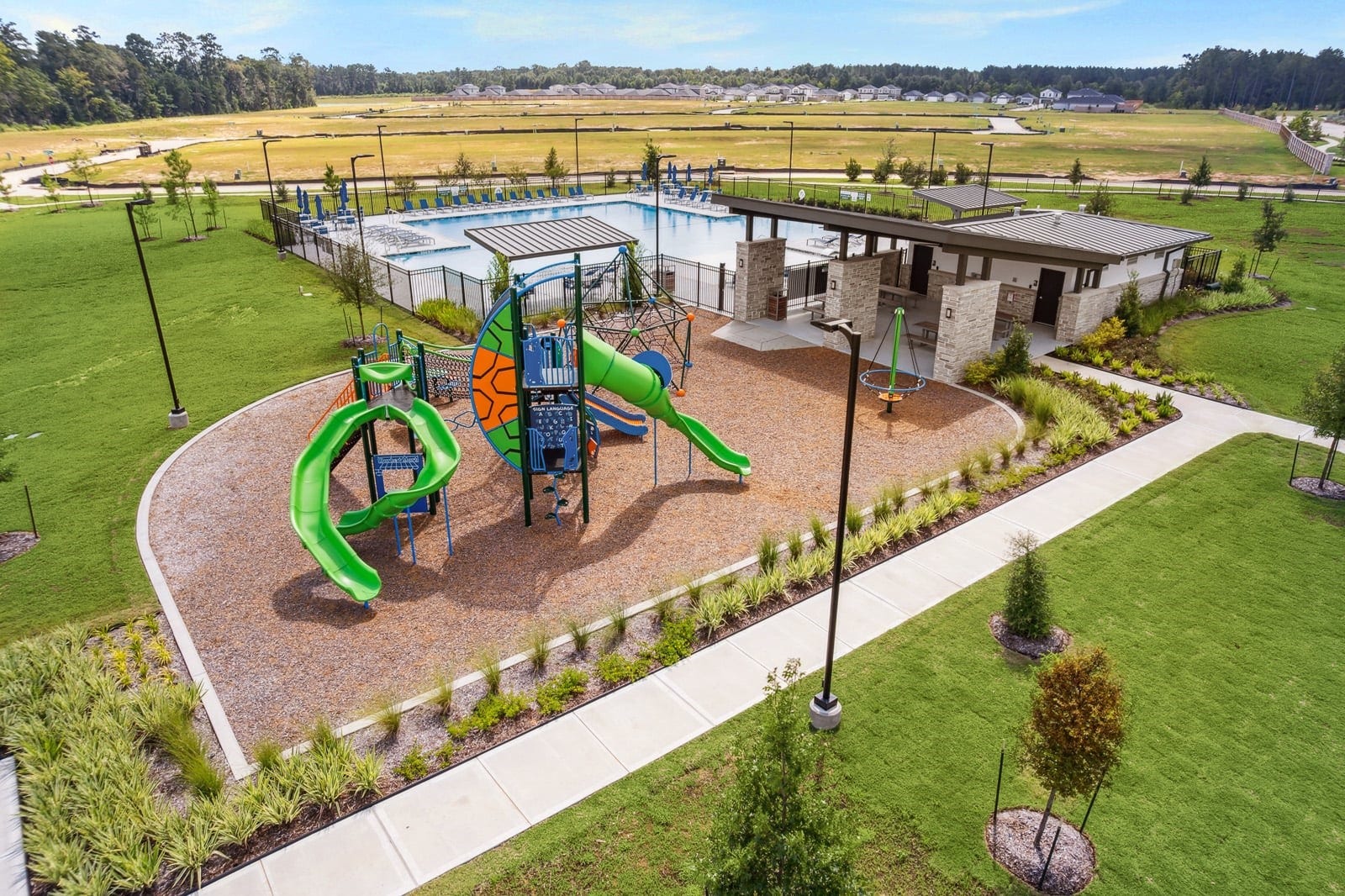 Canopies - Playground + Pool 2 - Amenity Photography - Risewell Homes