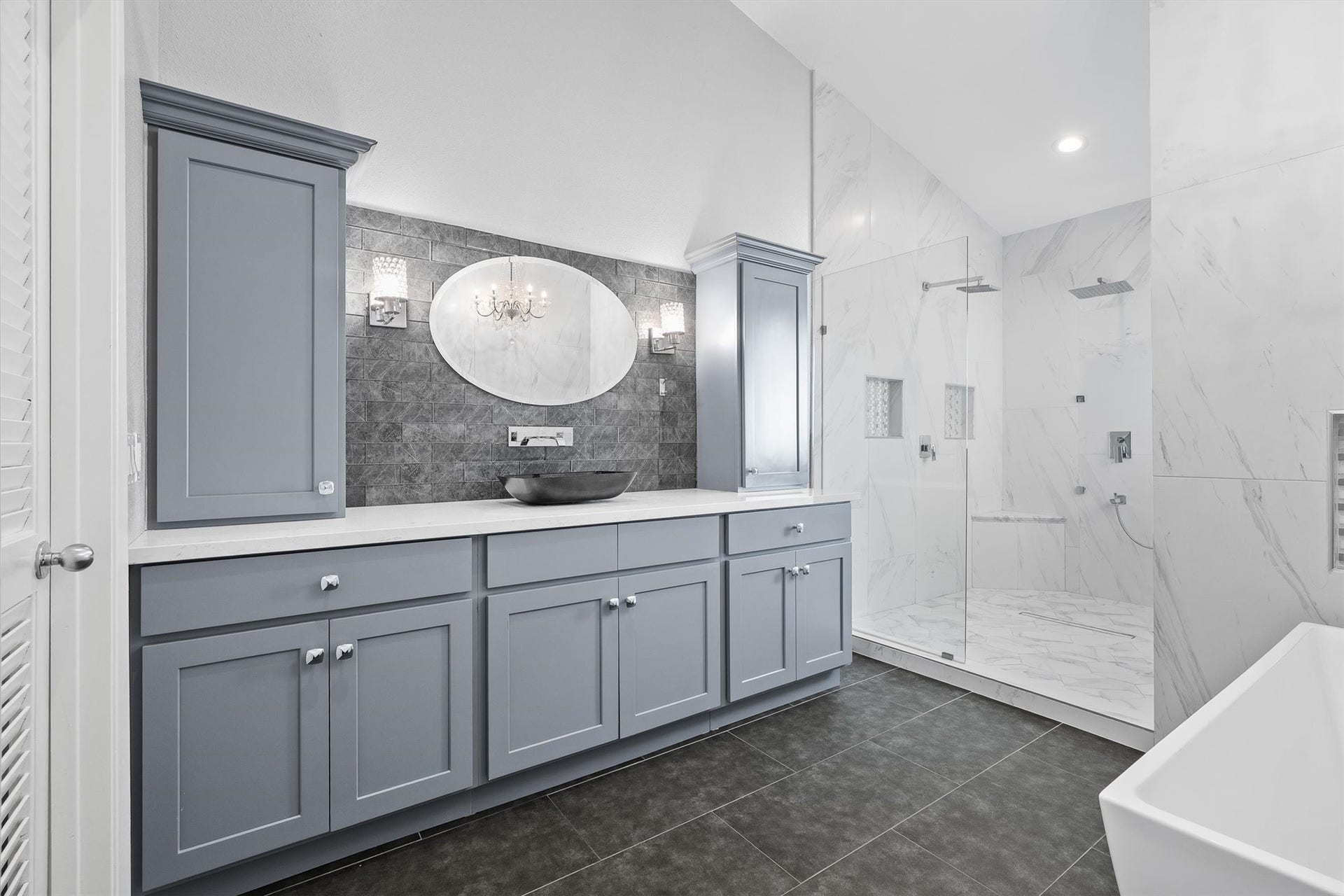 18217 Sandy Cove, Houston, TX 77058 Spa-like primary bathroom with upscale contemporary finishes.