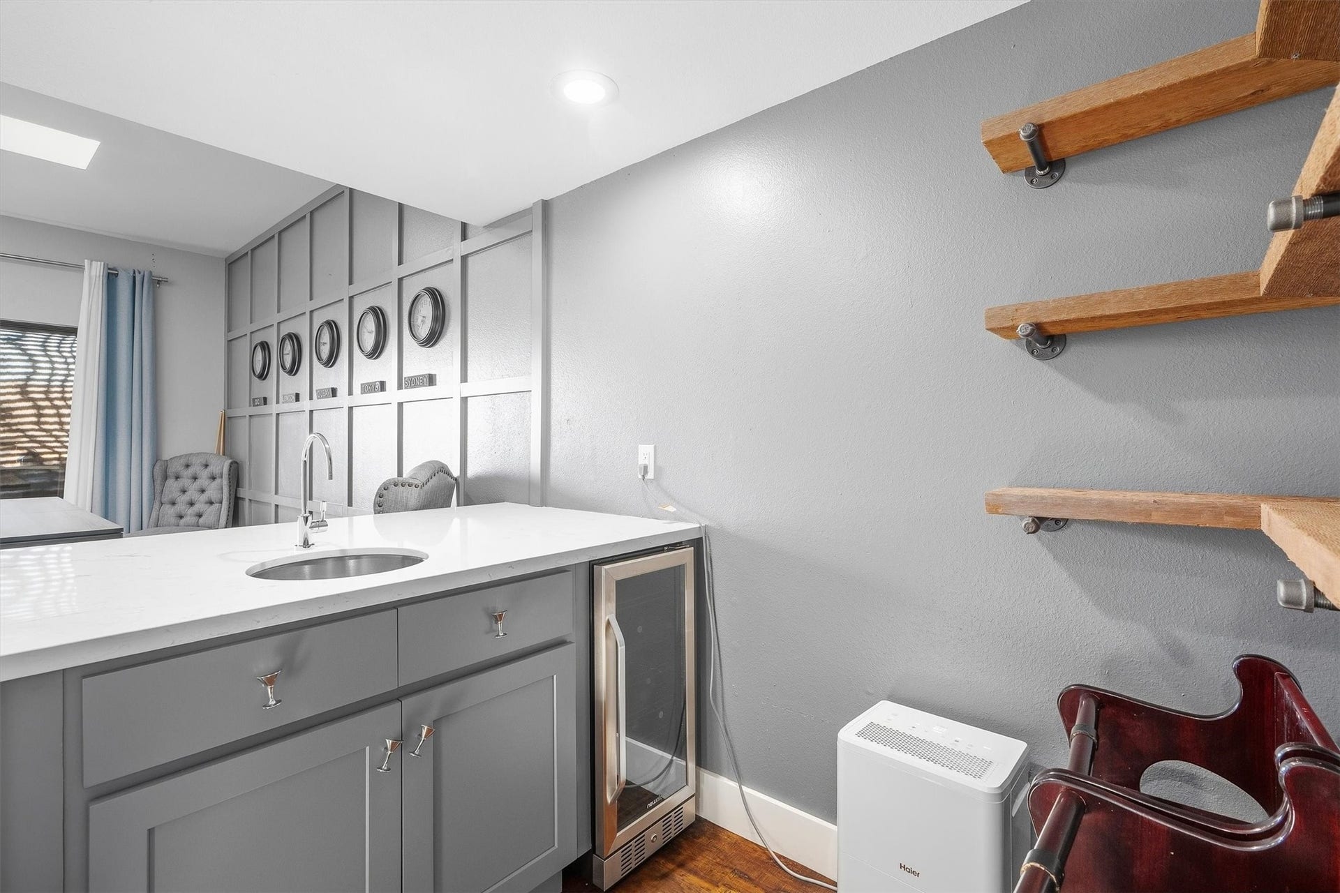 18217 Sandy Cove, Houston, TX 77058 Designer wet bar perfectly situated for entertaining guests.