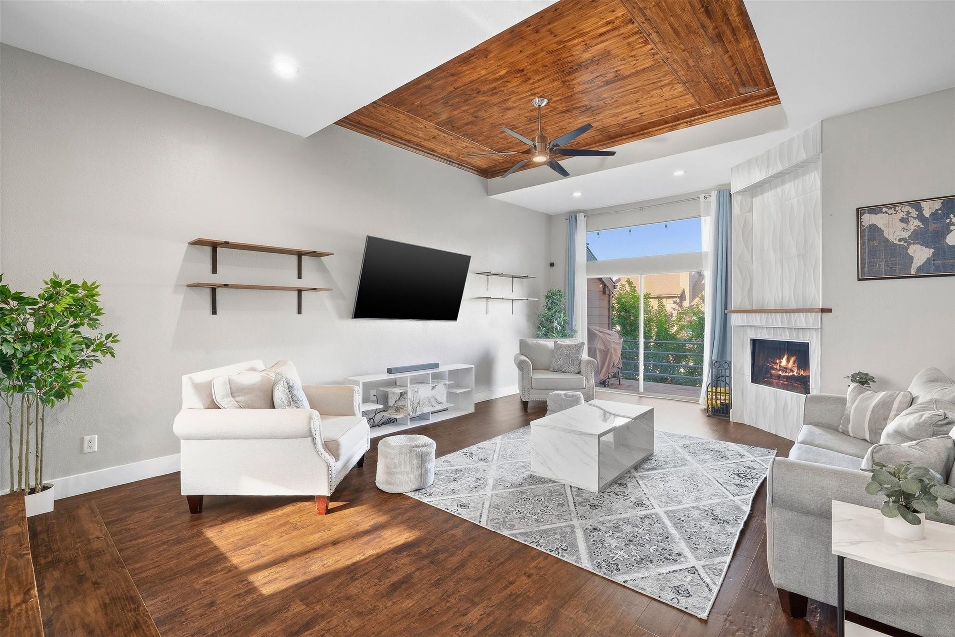 18217 Sandy Cove, Houston, TX 77058 Floor-to-ceiling glass doors leading out to the balcony.